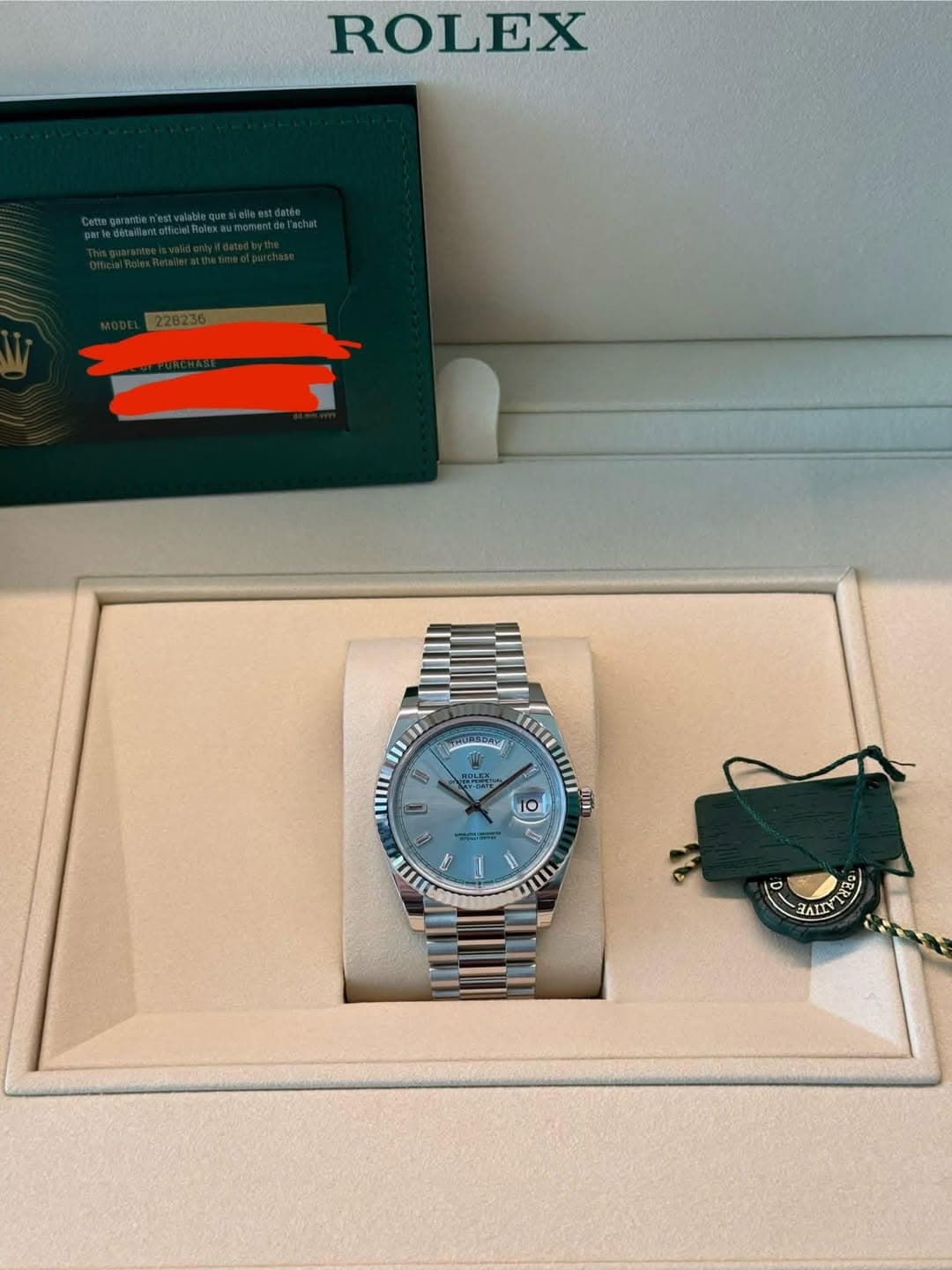 May be an image of wrist watch and text