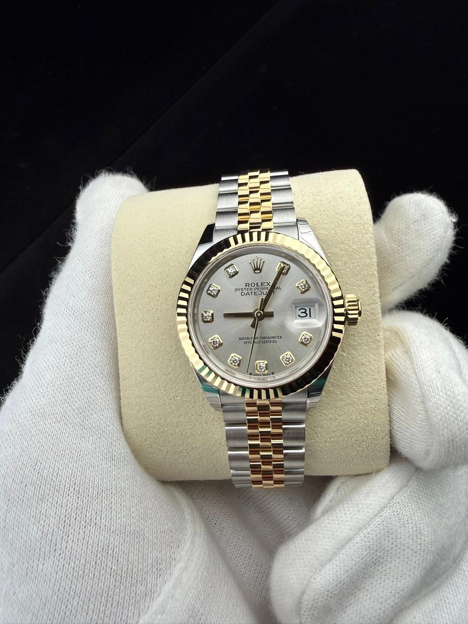 May be an image of wrist watch and text