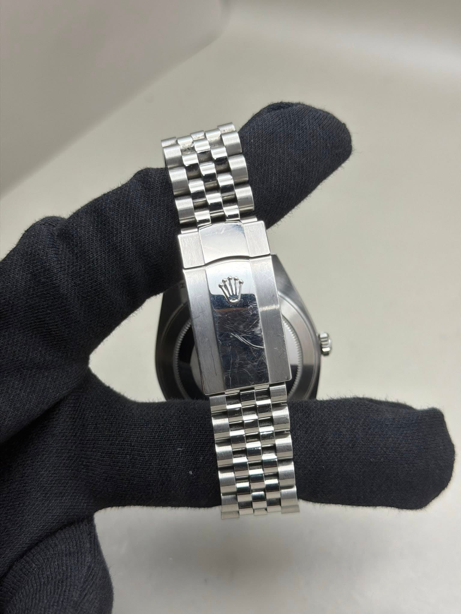 May be an image of wrist watch