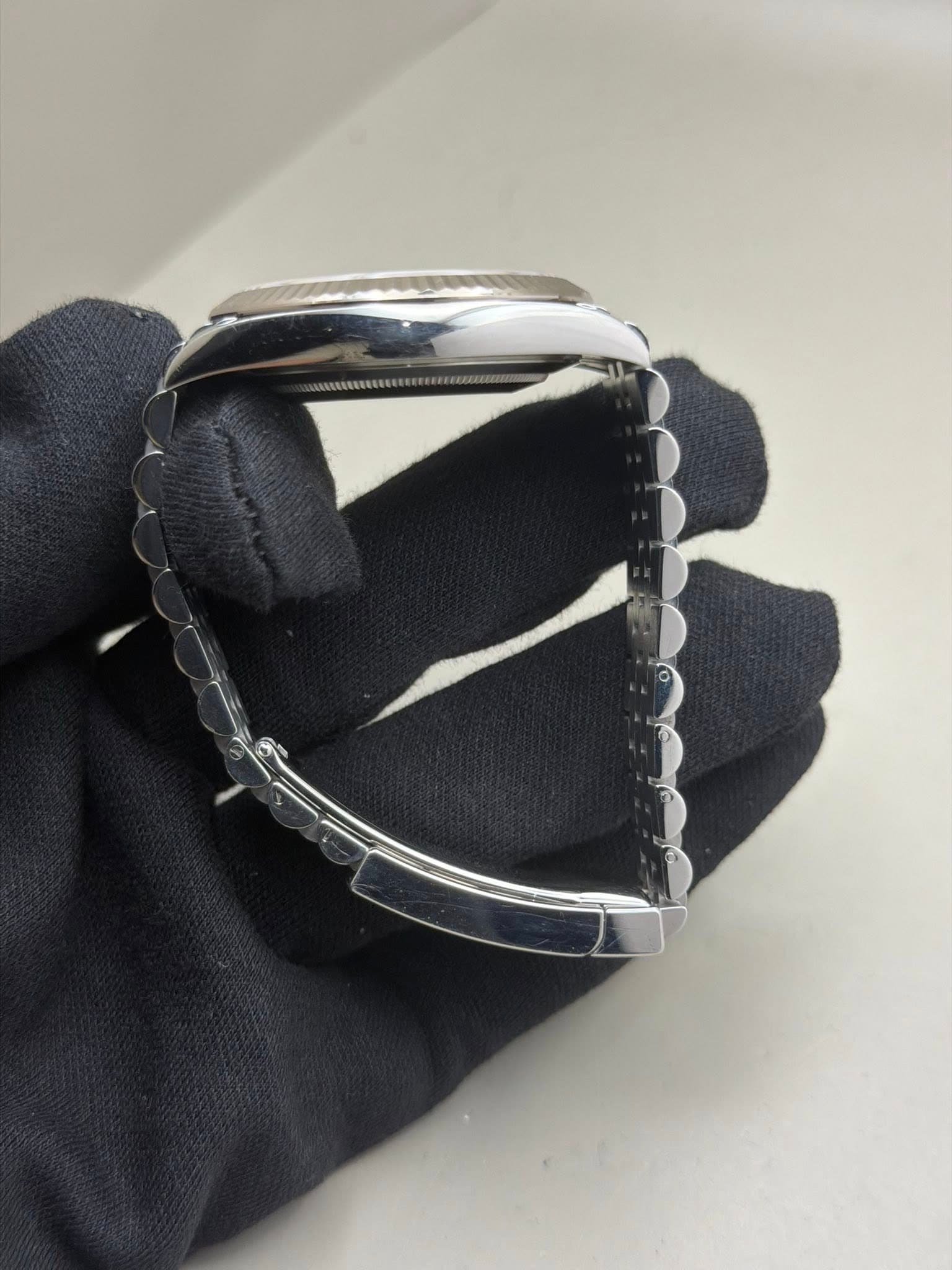 May be an image of jewelry and wrist watch