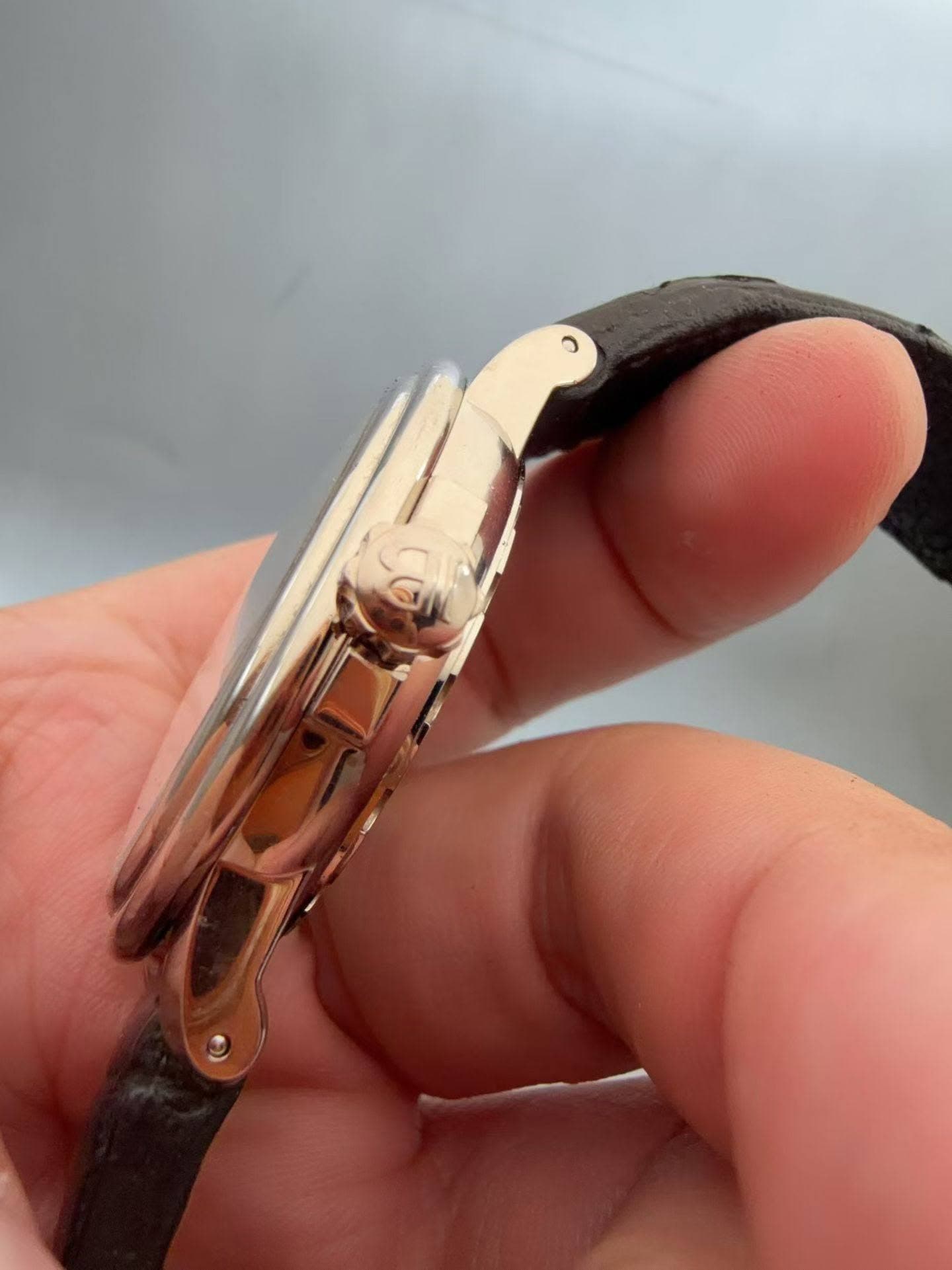 May be an image of wrist watch
