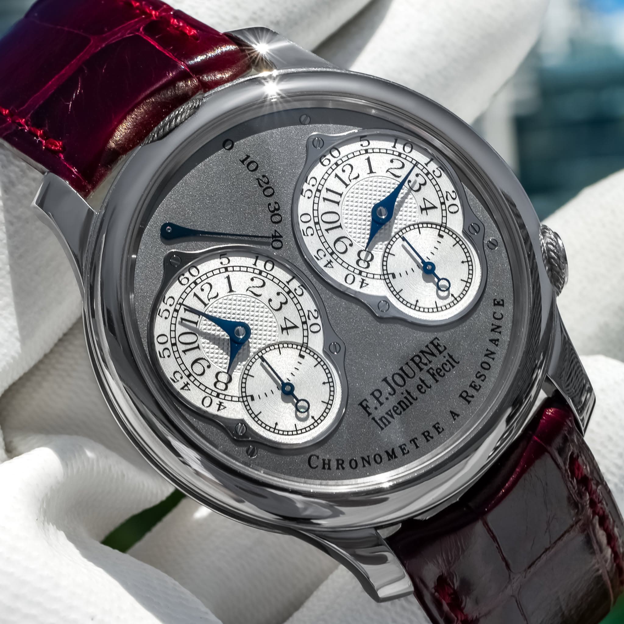 May be an image of wrist watch and text