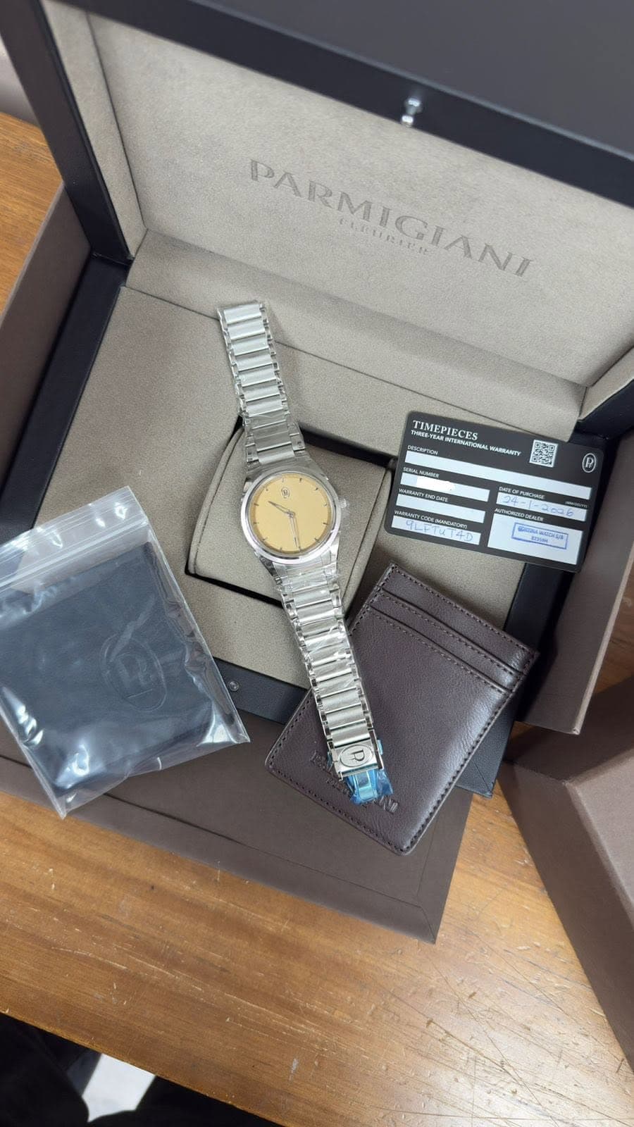May be an image of wrist watch and text