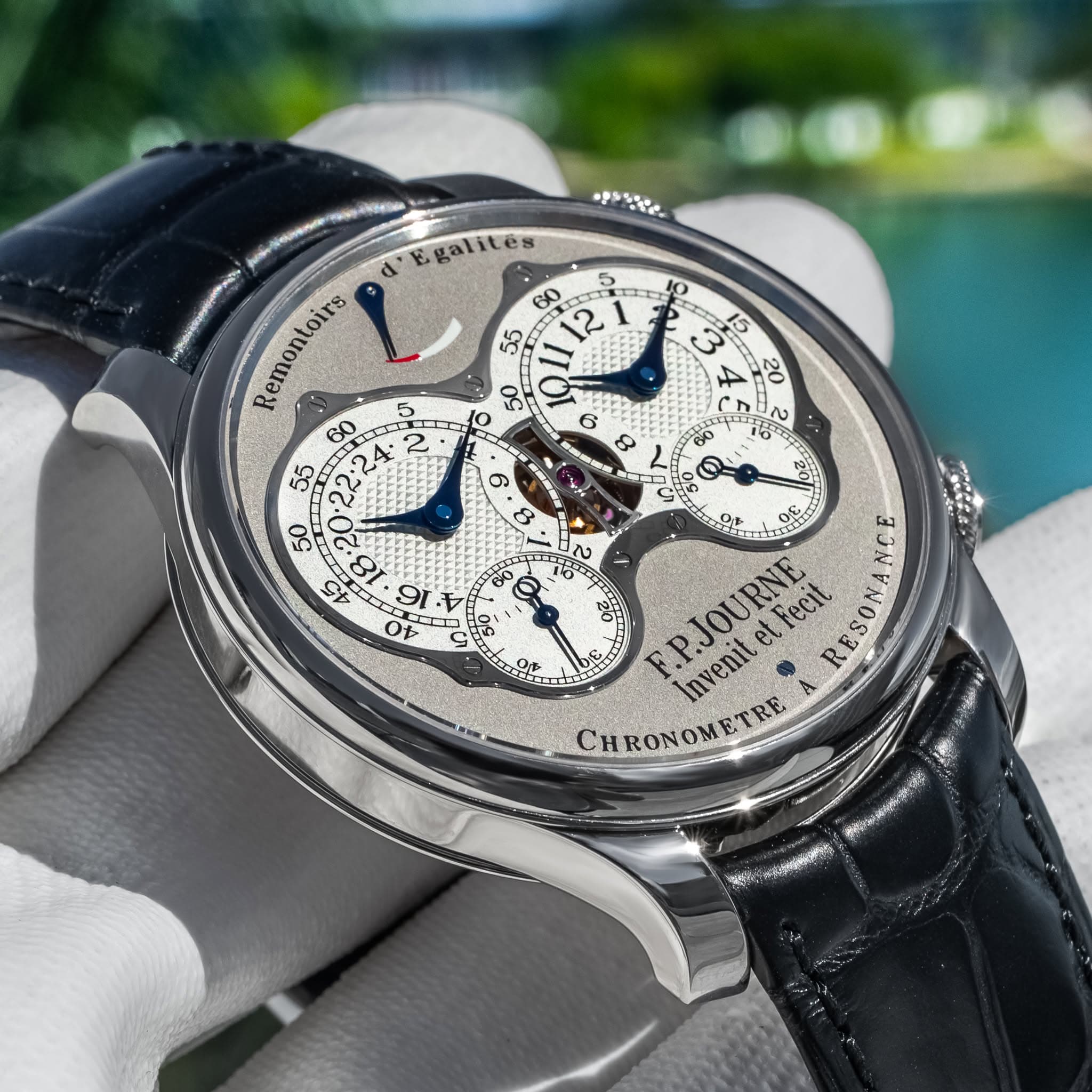 May be an image of wrist watch and text
