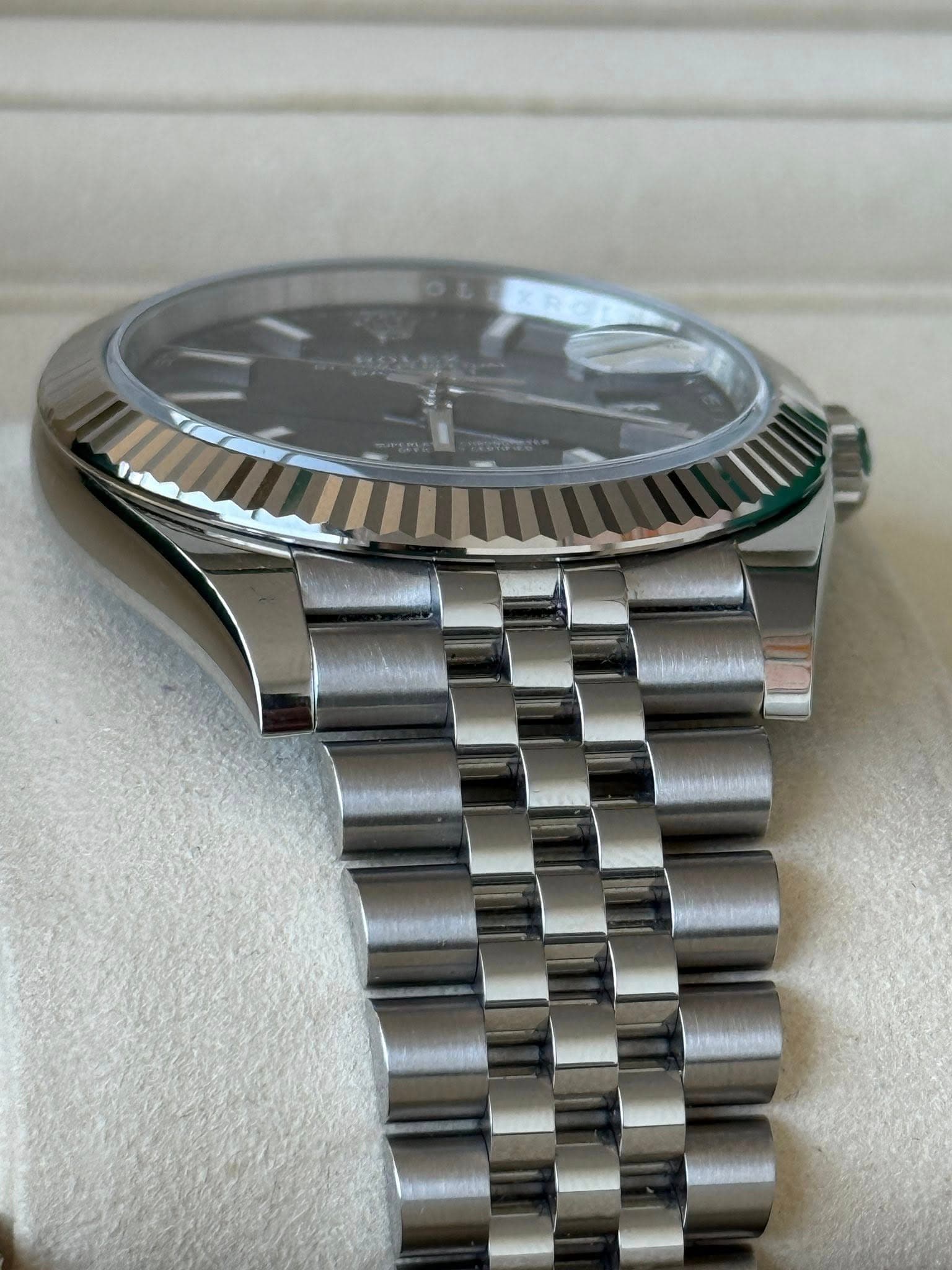 May be an image of wrist watch