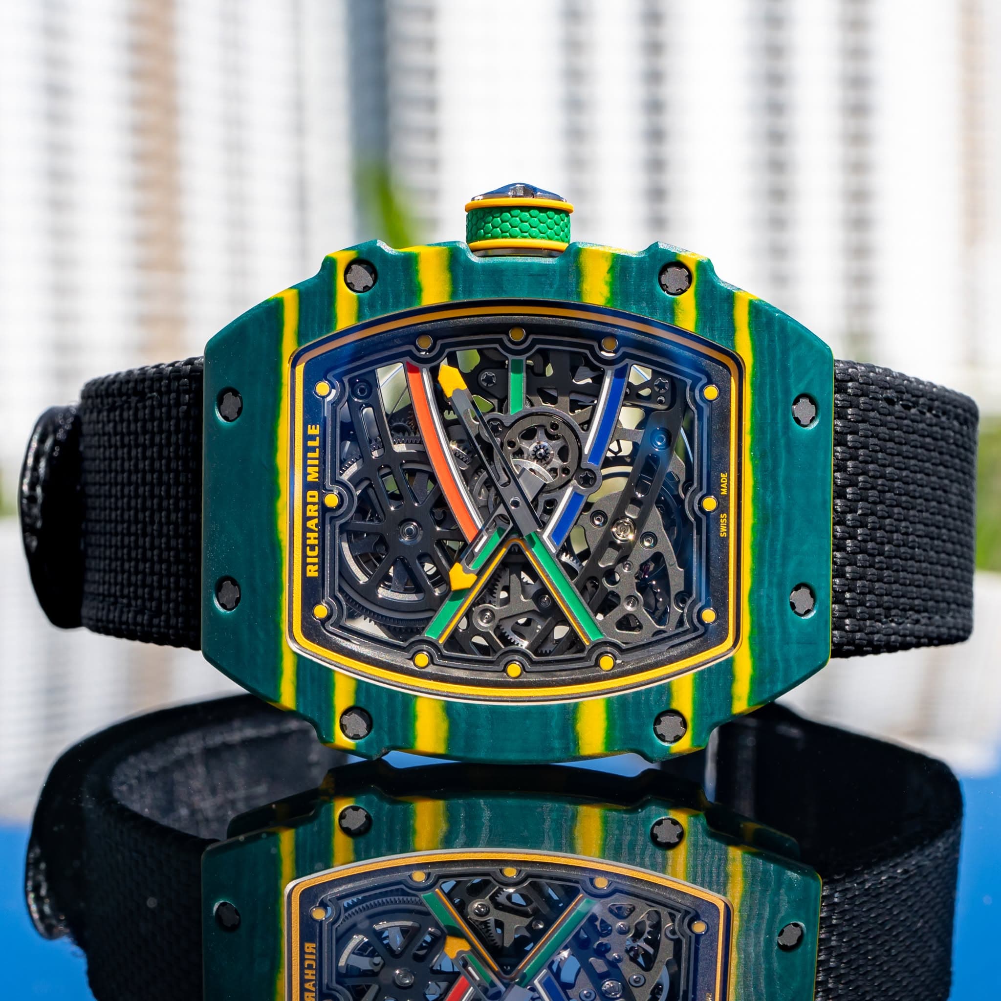 May be an image of wrist watch and text