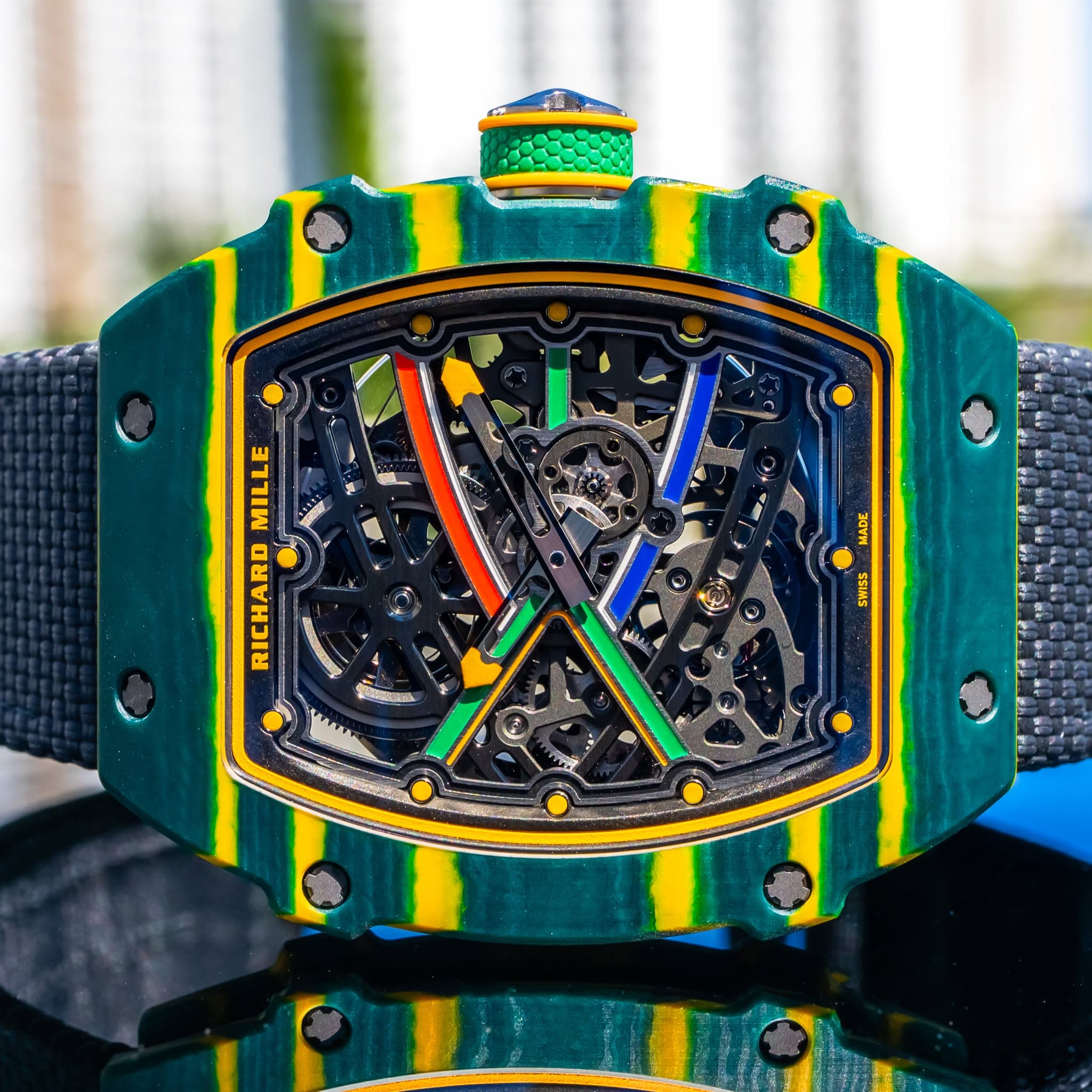 May be an image of wrist watch and text