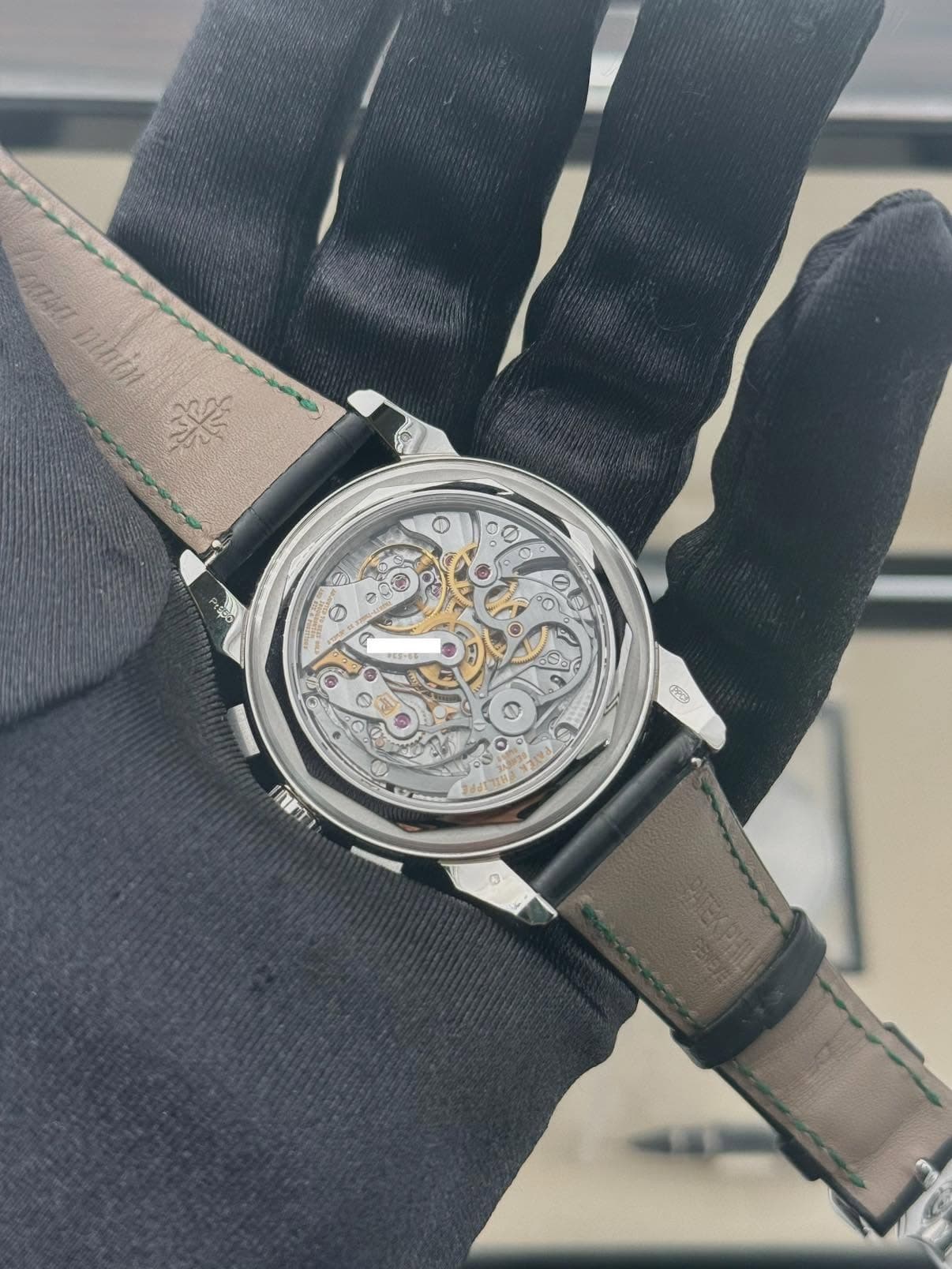 May be an image of wrist watch and text
