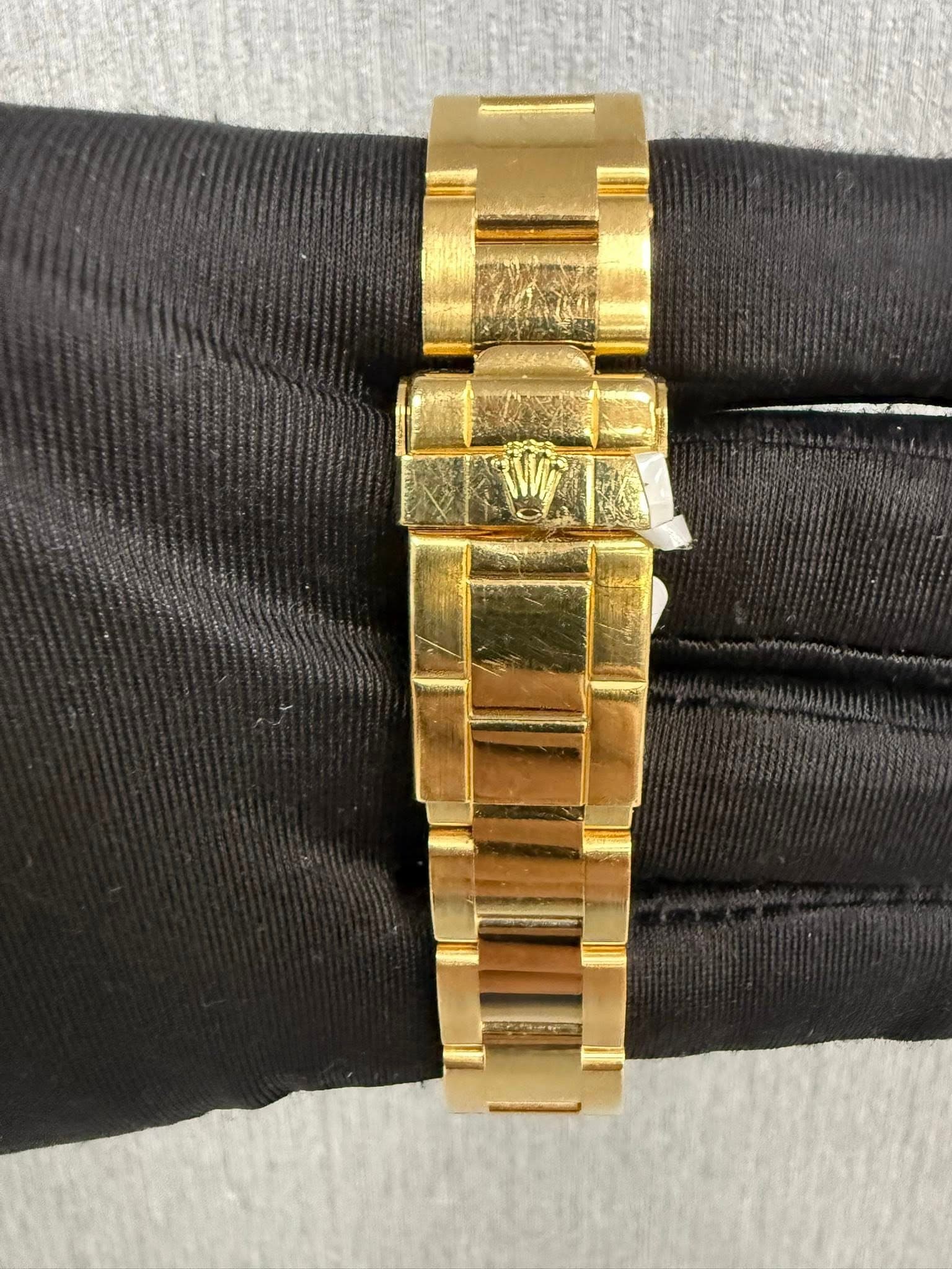 May be an image of wrist watch