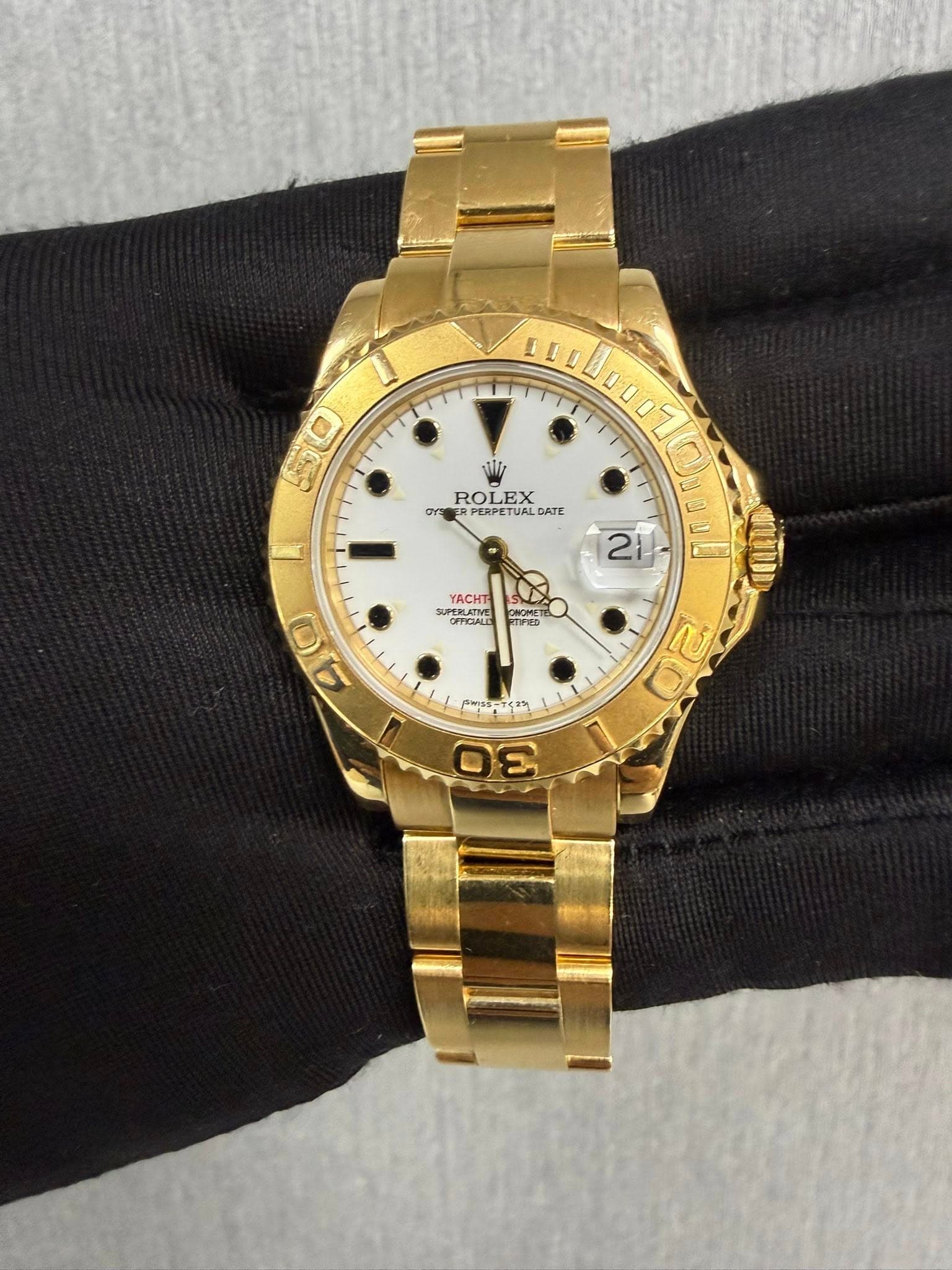 May be an image of wrist watch and text