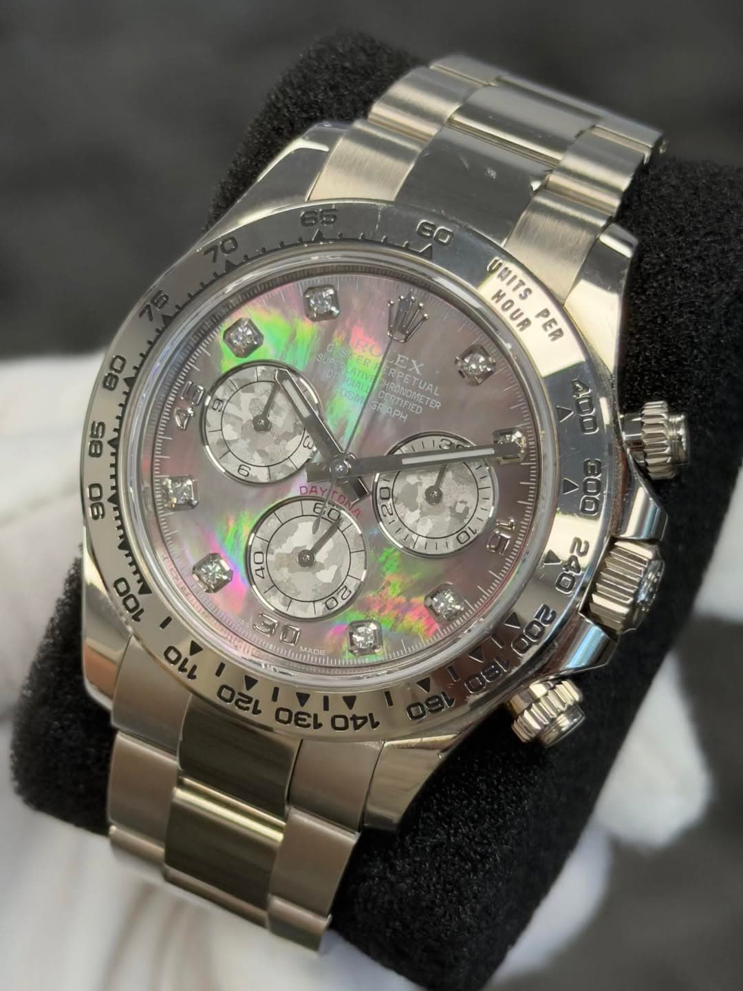 May be an image of wrist watch and text