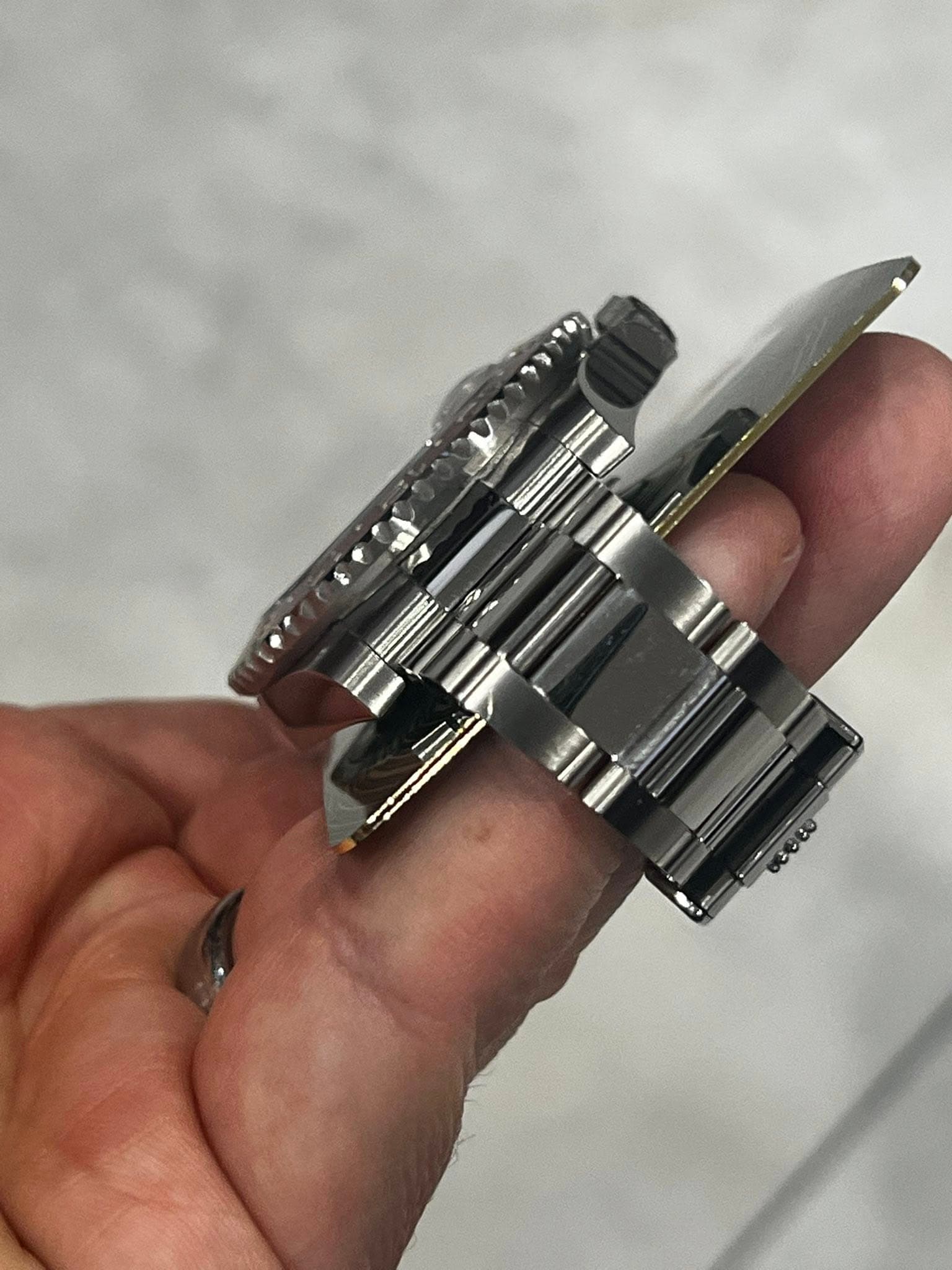May be an image of wrist watch