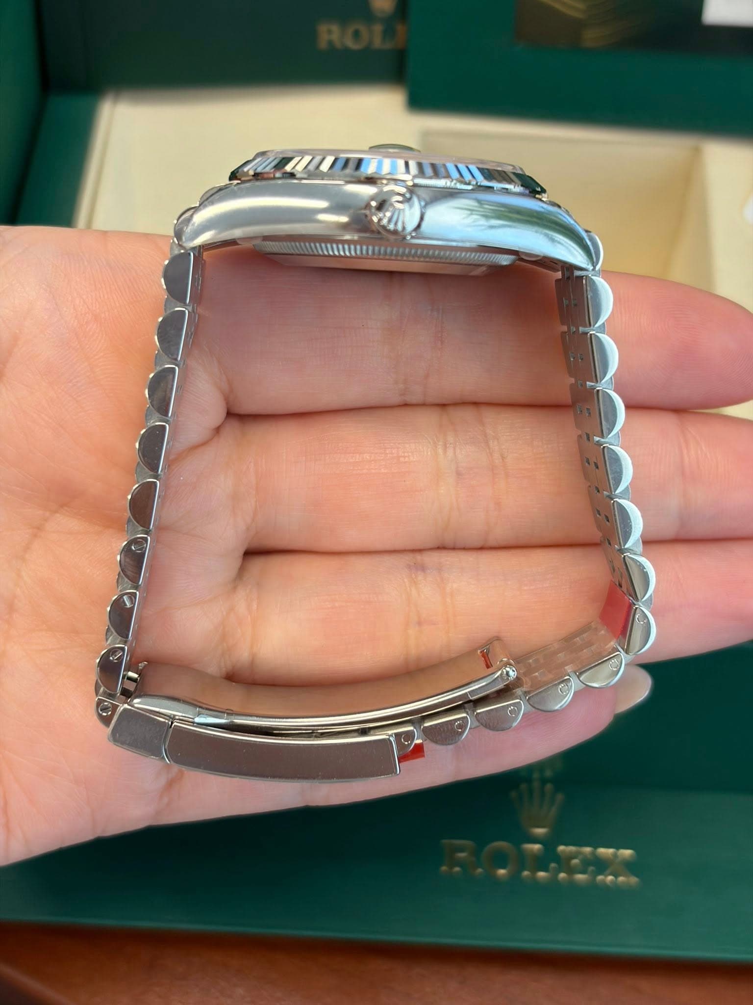May be an image of wrist watch