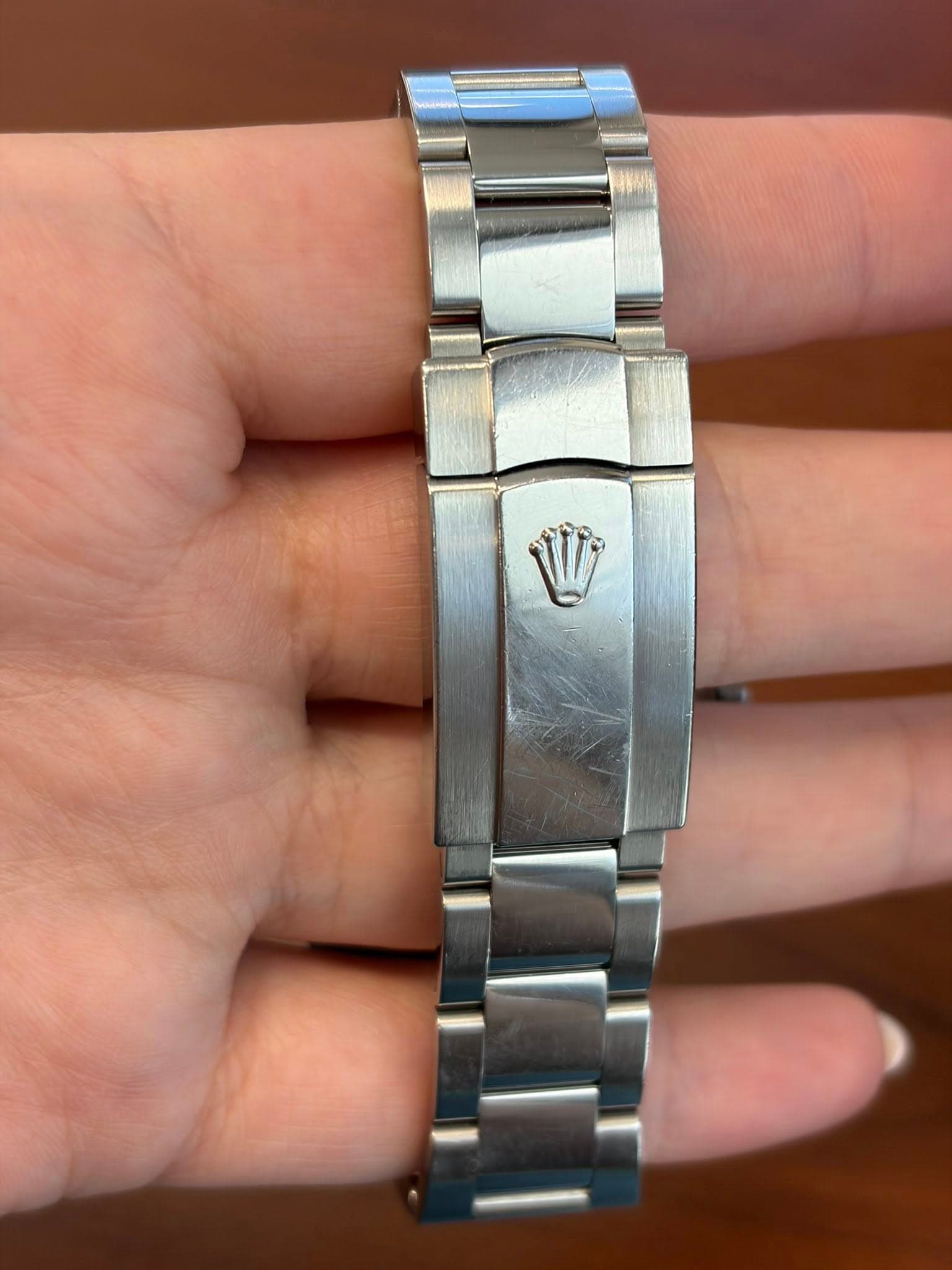 May be an image of wrist watch