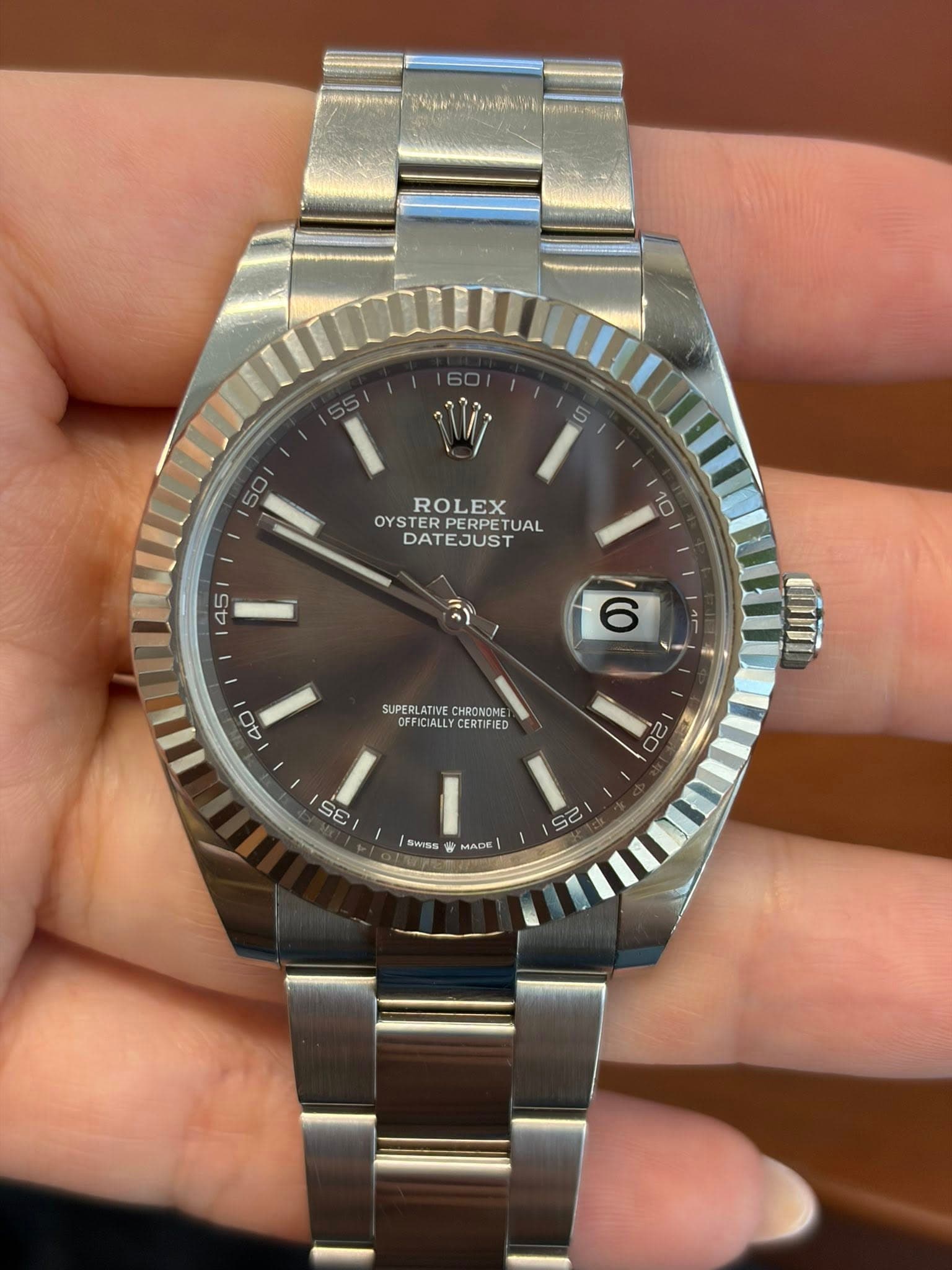 May be an image of wrist watch and text that says '50 ROLEX OYSTER OYS RPETUAL TUAL DATEJUST 10 45 يا 6 III 40 SUPERLATIVE SUPERATALN CHRONON OFFICIALL FICIALLYCERTIFIED…
