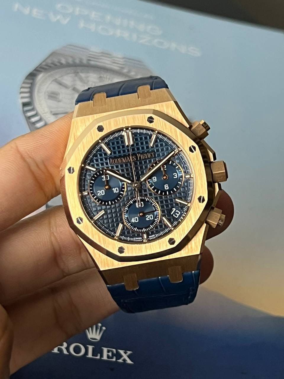 May be an image of wrist watch and text