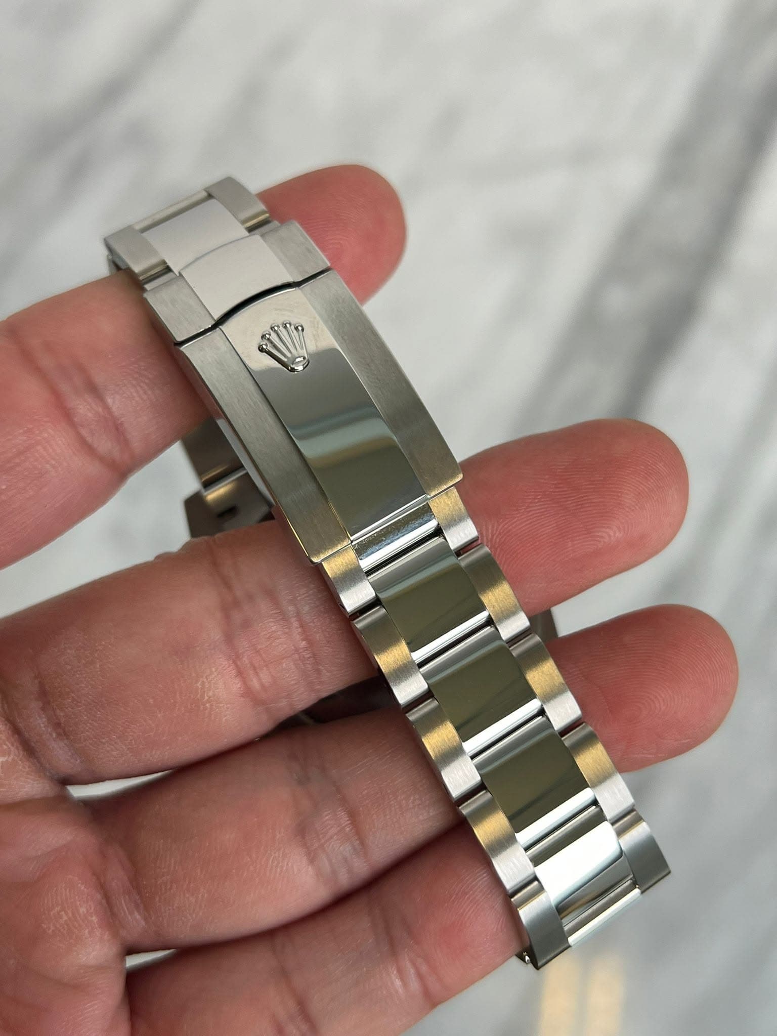 May be an image of wrist watch
