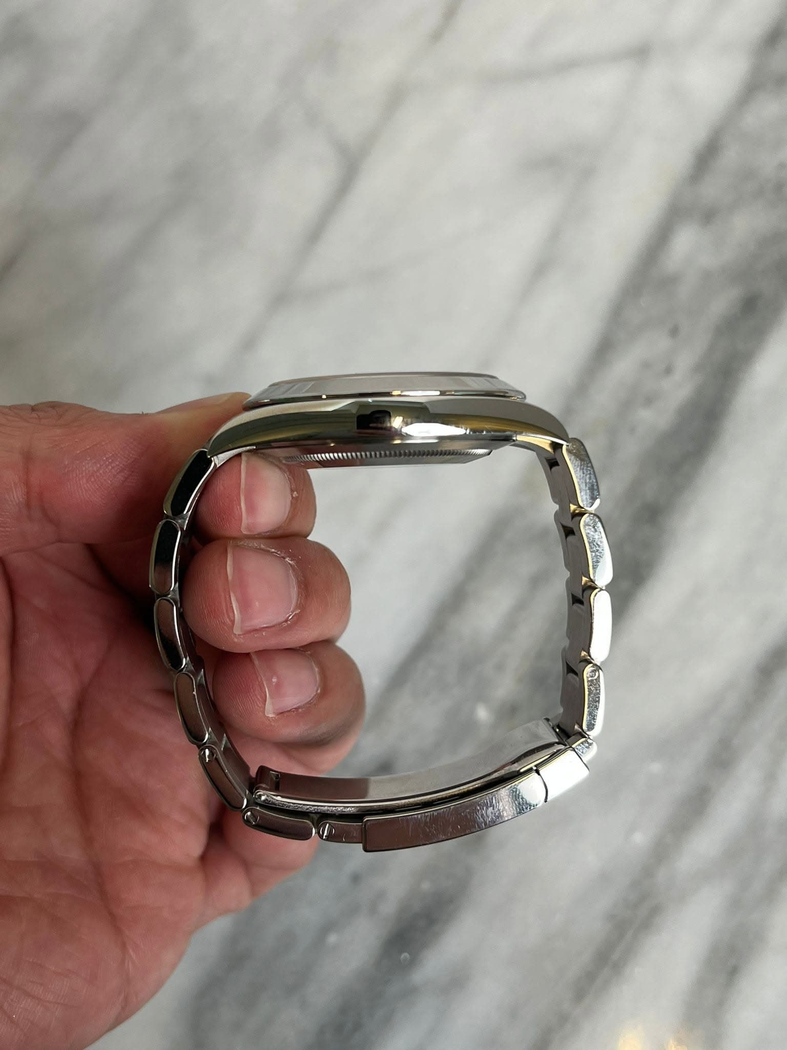 May be an image of wrist watch