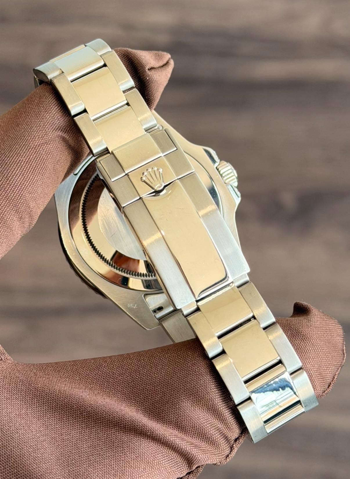 May be an image of wrist watch, jewelry and text