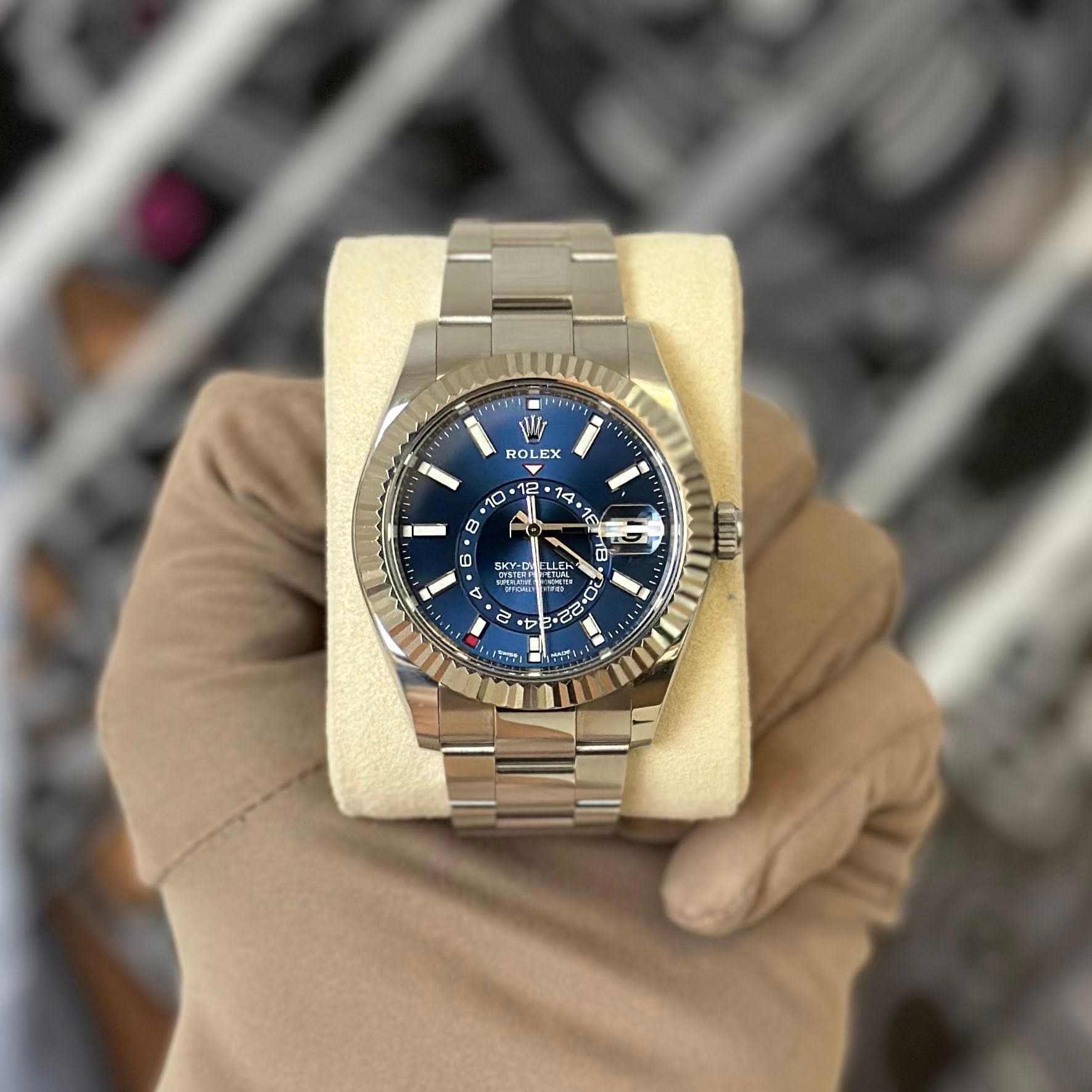 May be an image of wrist watch and text