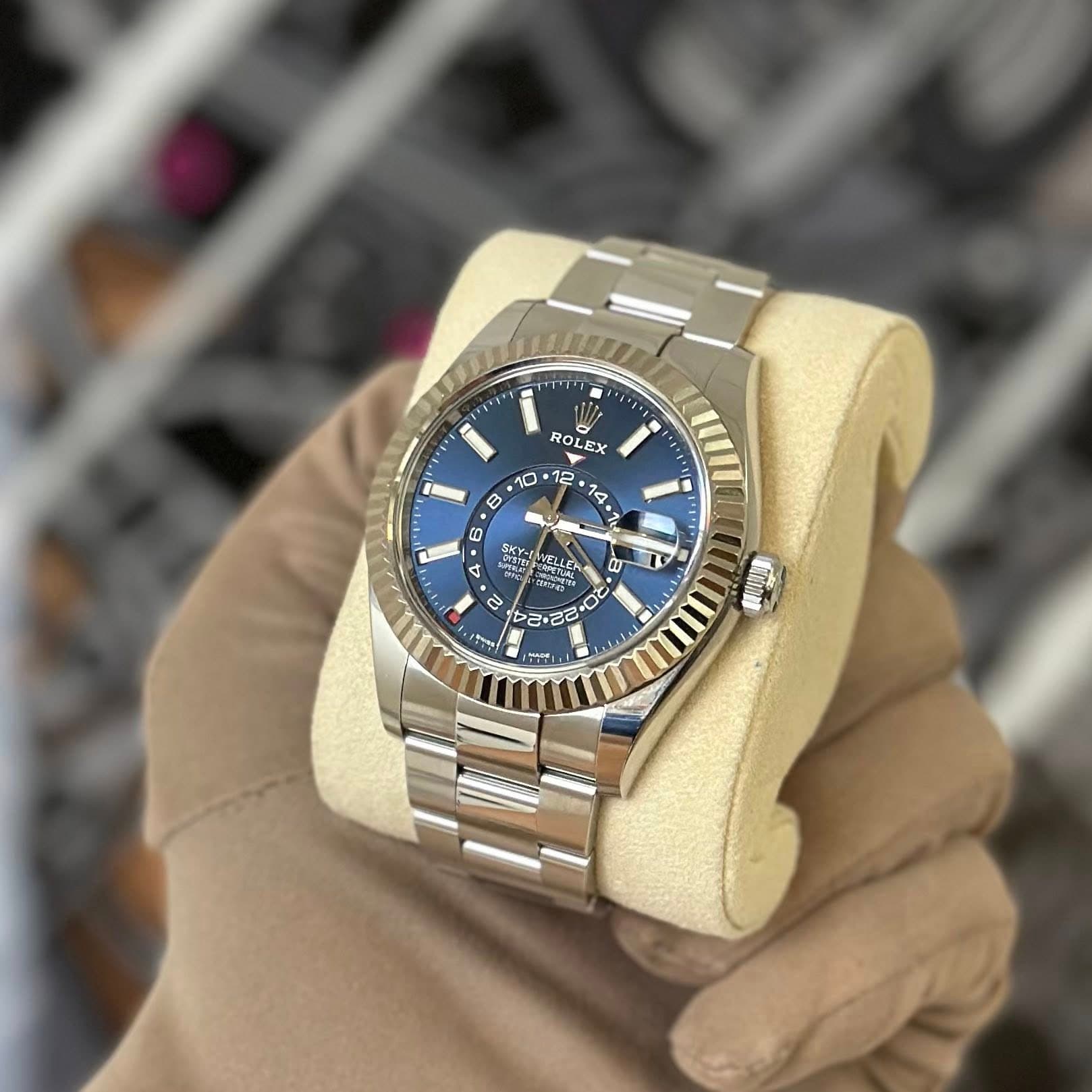May be an image of wrist watch and text