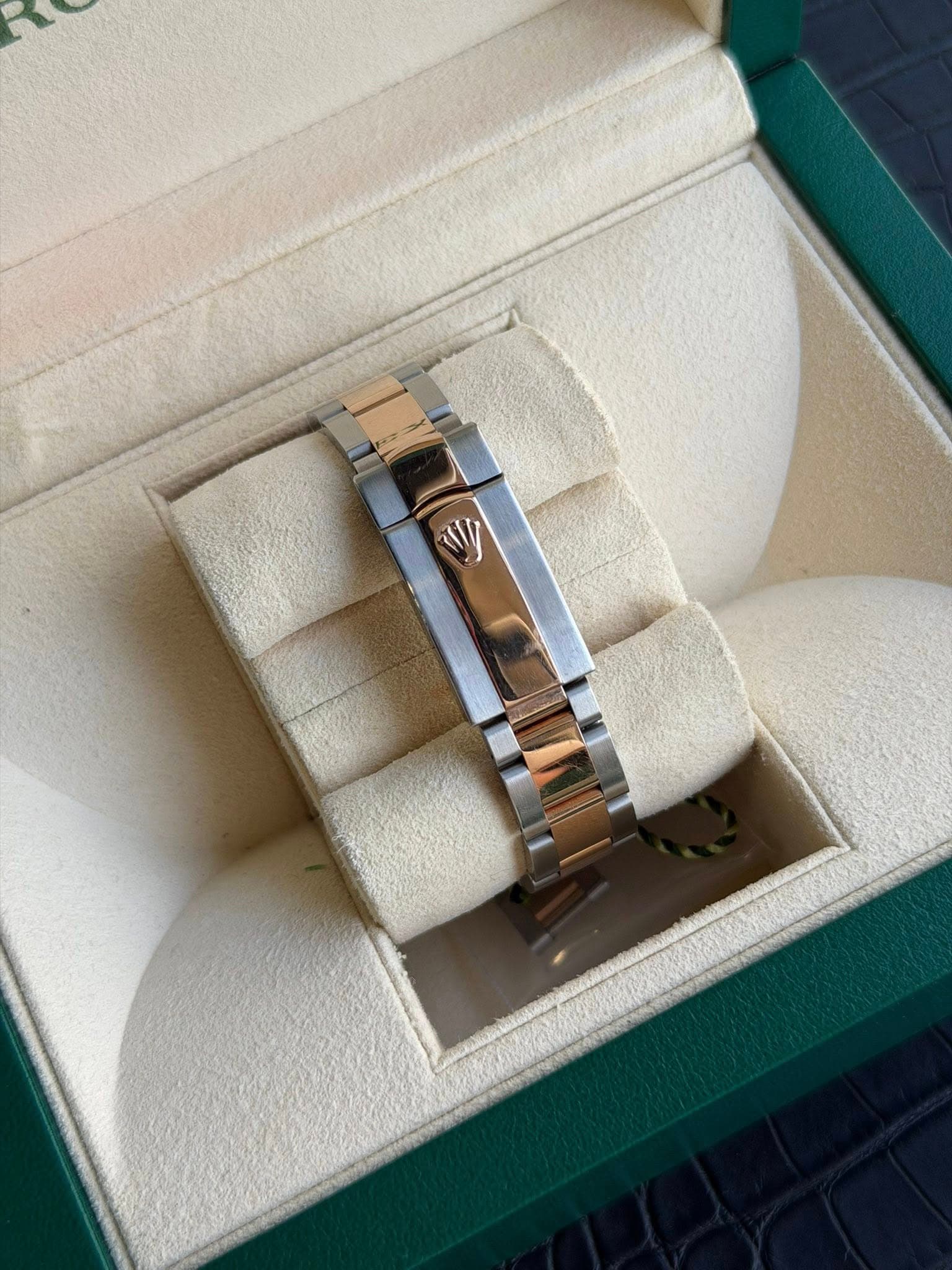 May be an image of wrist watch, jewelry and text