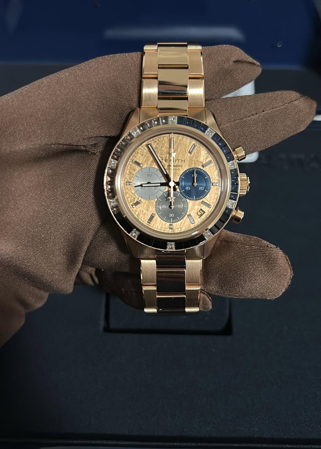 May be an image of wrist watch and text