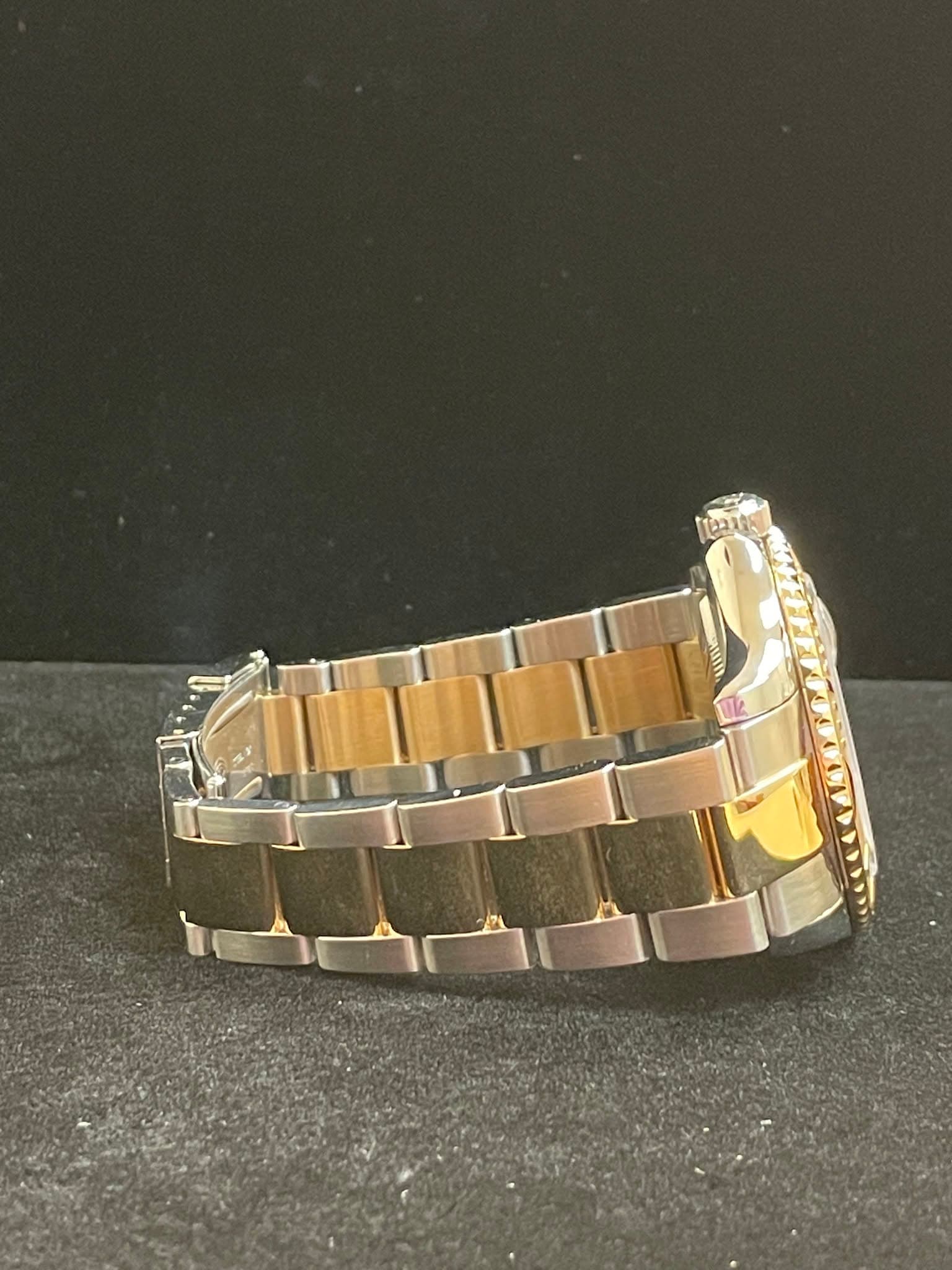 May be an image of jewelry and wrist watch
