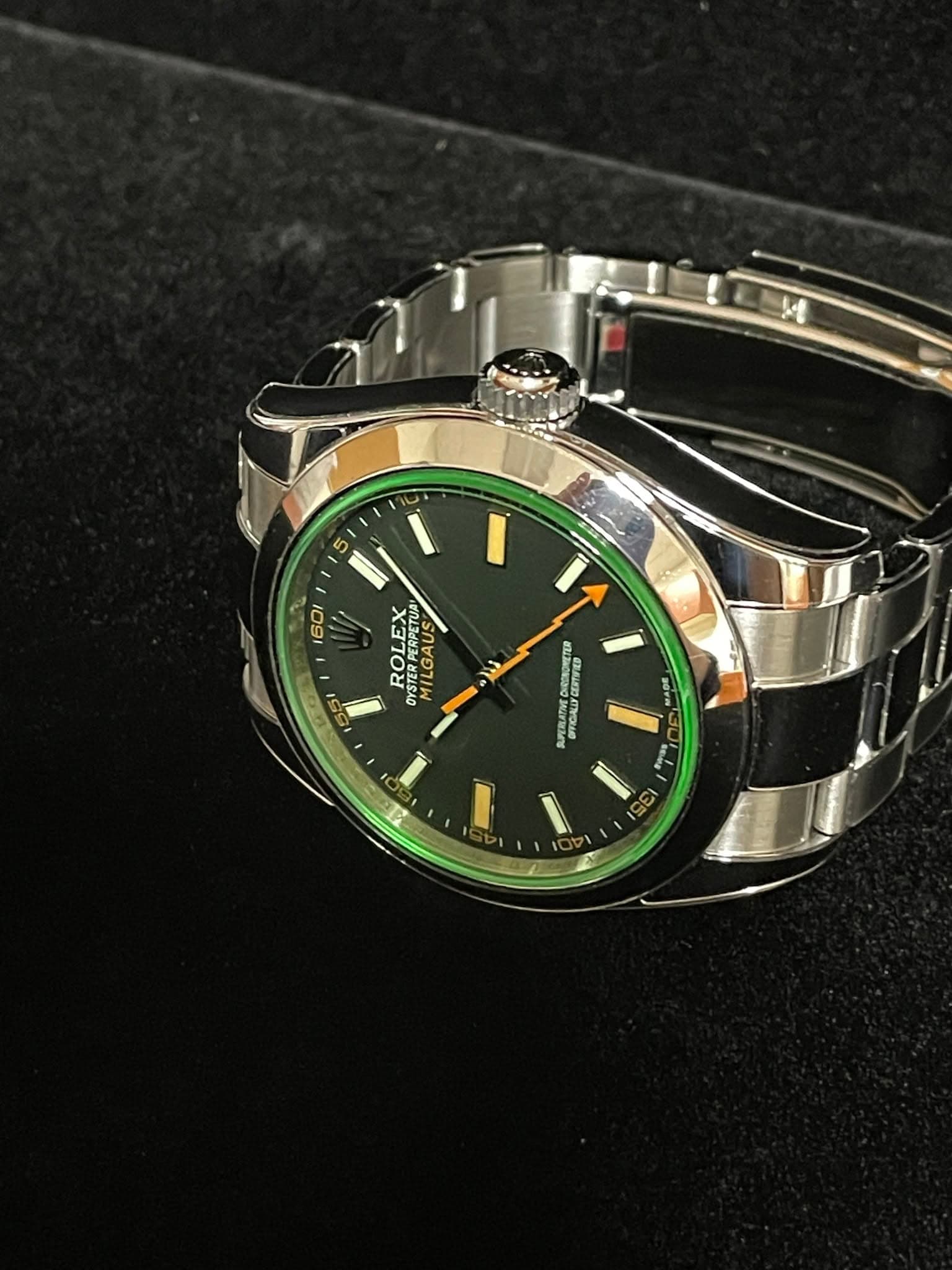May be an image of wrist watch and text