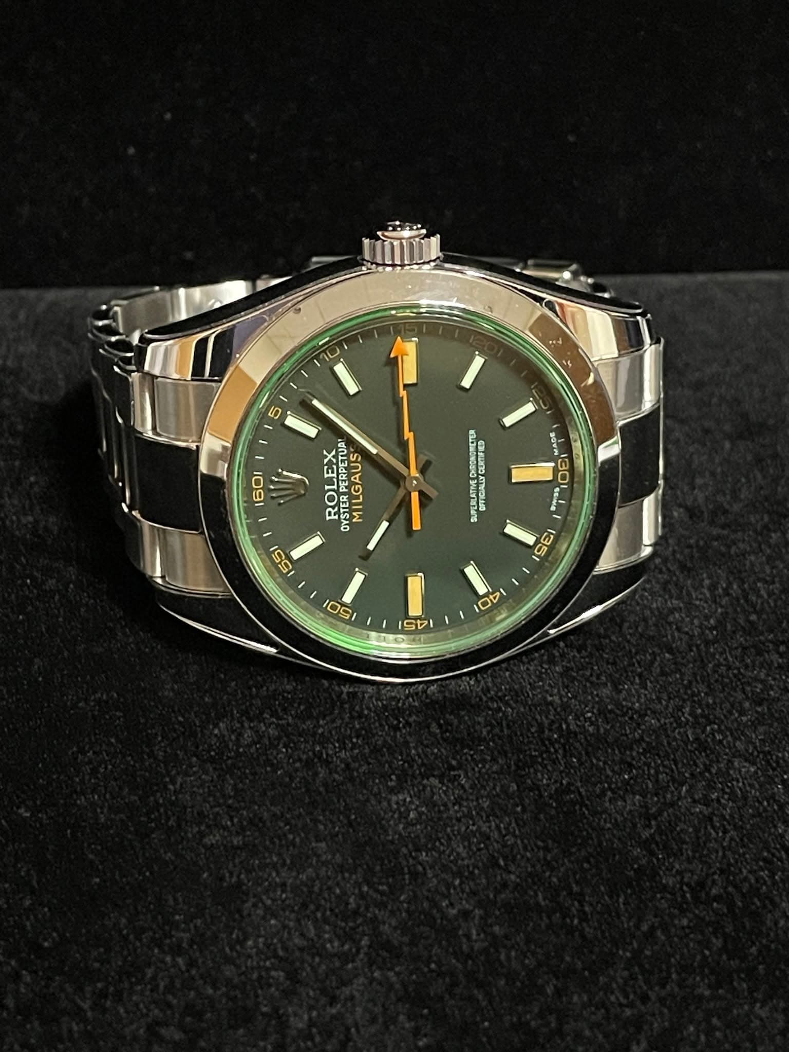 May be an image of wrist watch and text