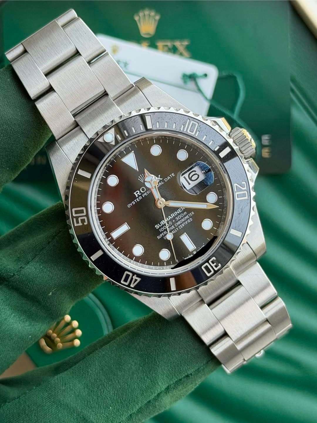May be an image of wrist watch and text