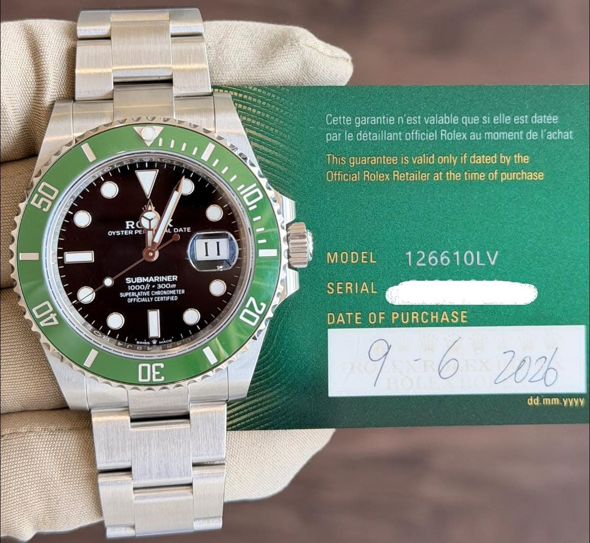 May be an image of wrist watch and text that says 'WA Cette garantie est valable que elle est datée par le déta détaillan illant officiel Rolex au moment de achat 50 RO YSTER ERP…