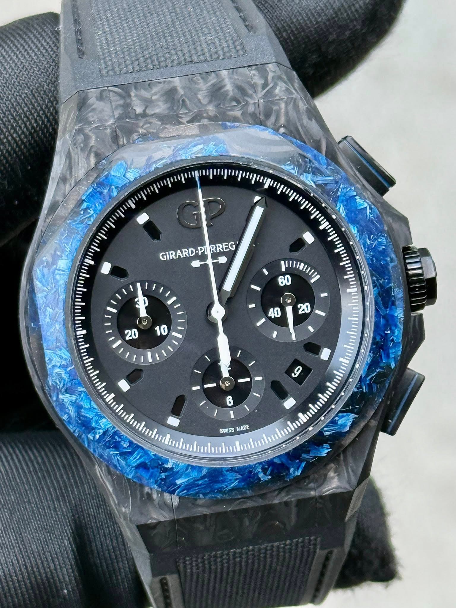May be an image of wrist watch and text that says 'GIRARD- GIRARD-PURREG PL ERREG 0 μμμθιιη 60 ခ SWISS MADE 5'