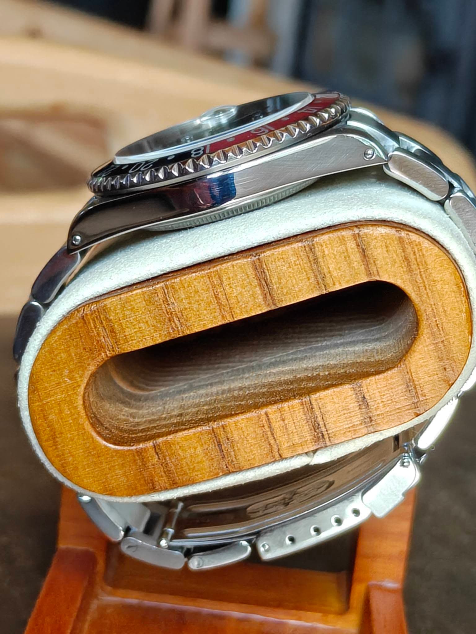 May be an image of wrist watch and text