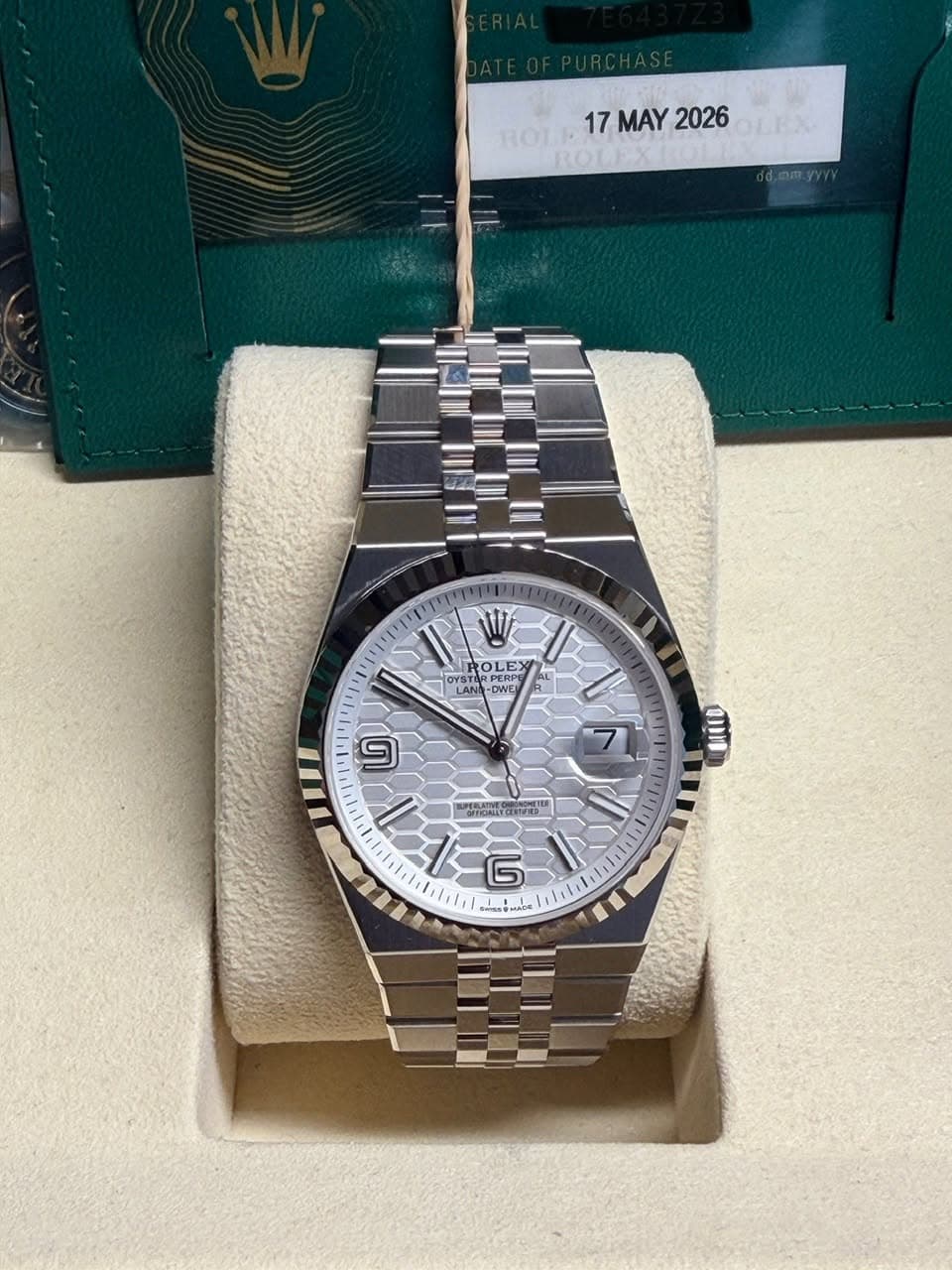 May be an image of wrist watch and text