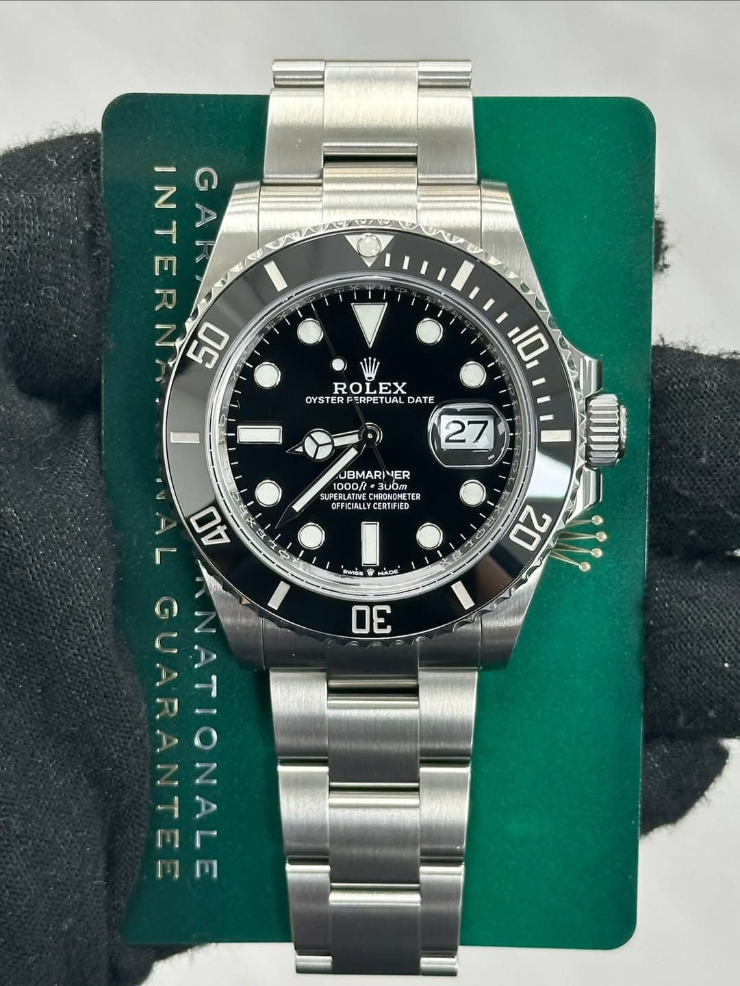 May be an image of wrist watch and text that says 'N TEEEE ๑ 제 50 أ ROLEX EX OYSTER OYSTERPERPE DATE 10 6) 27 UBMARIVER NER 1000ft OR =300m SUPER SUPERLATIN UPERLATIVE…
