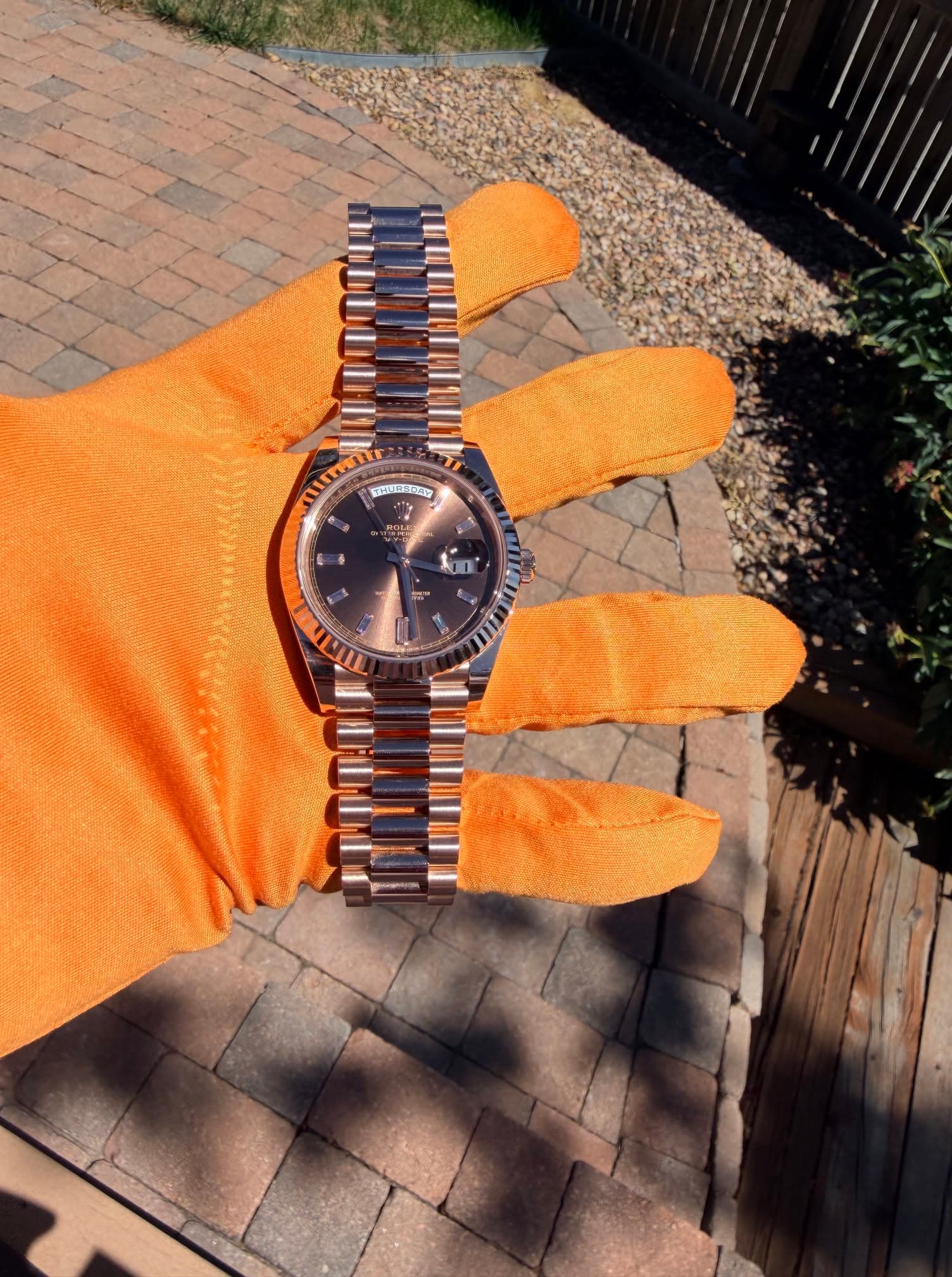 May be an image of wrist watch and text