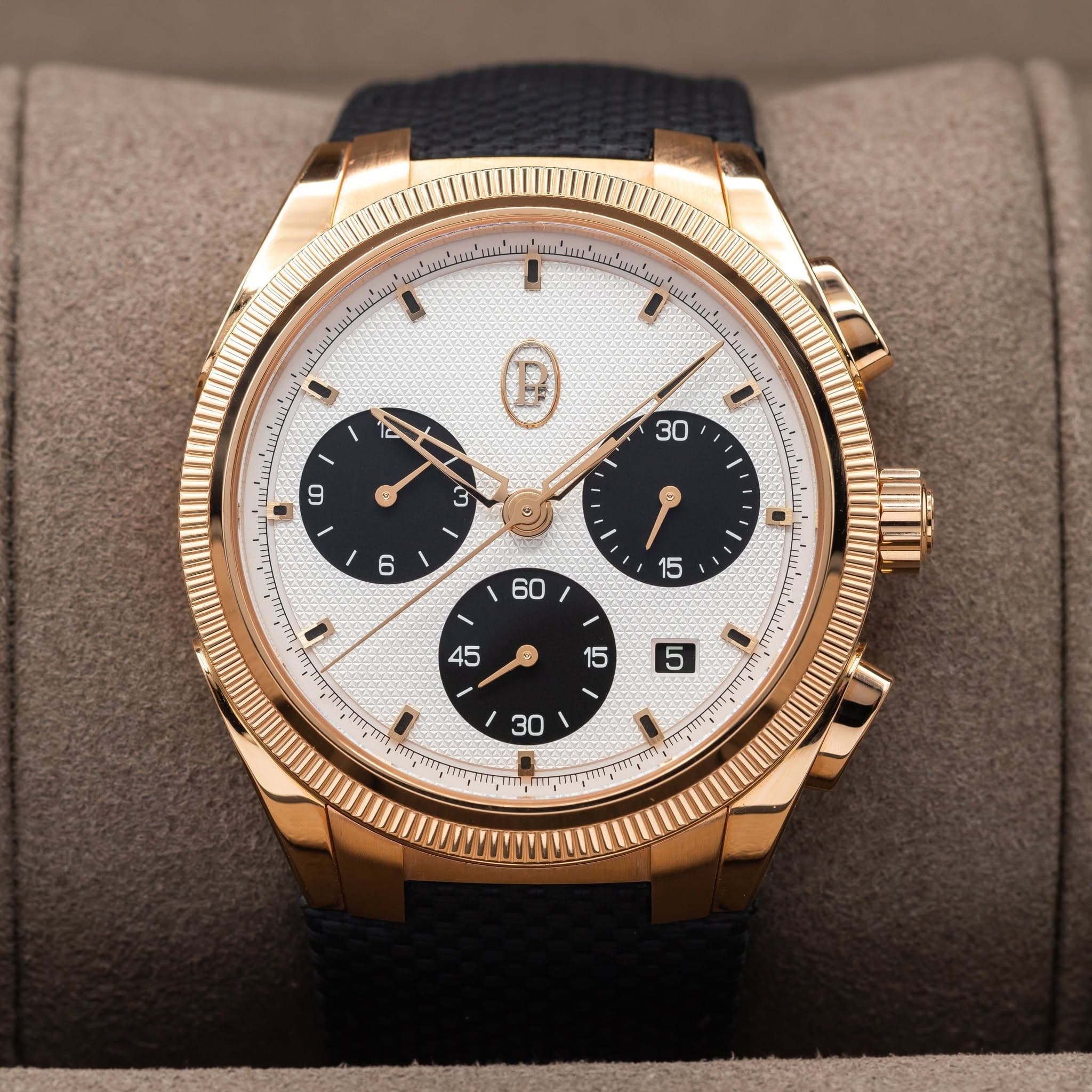 May be an image of wrist watch and text