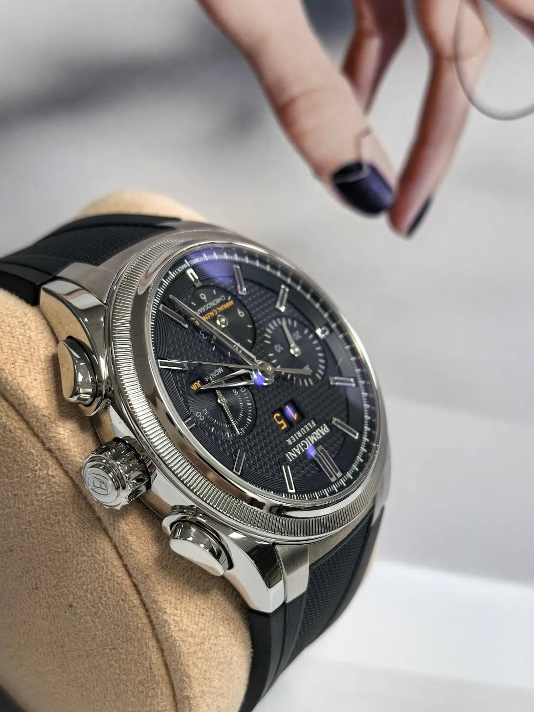 May be an image of wrist watch and text