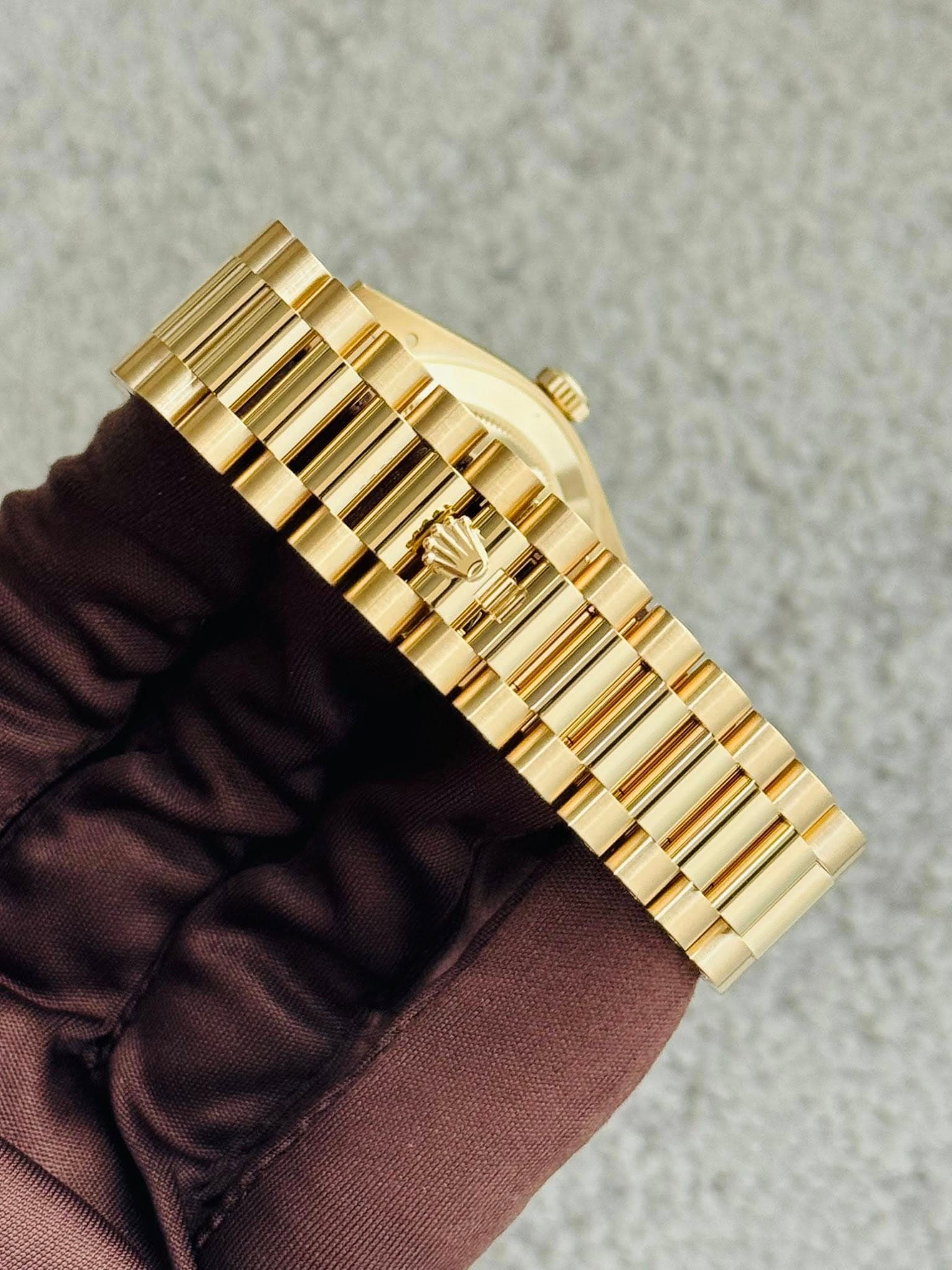 May be an image of wrist watch and text