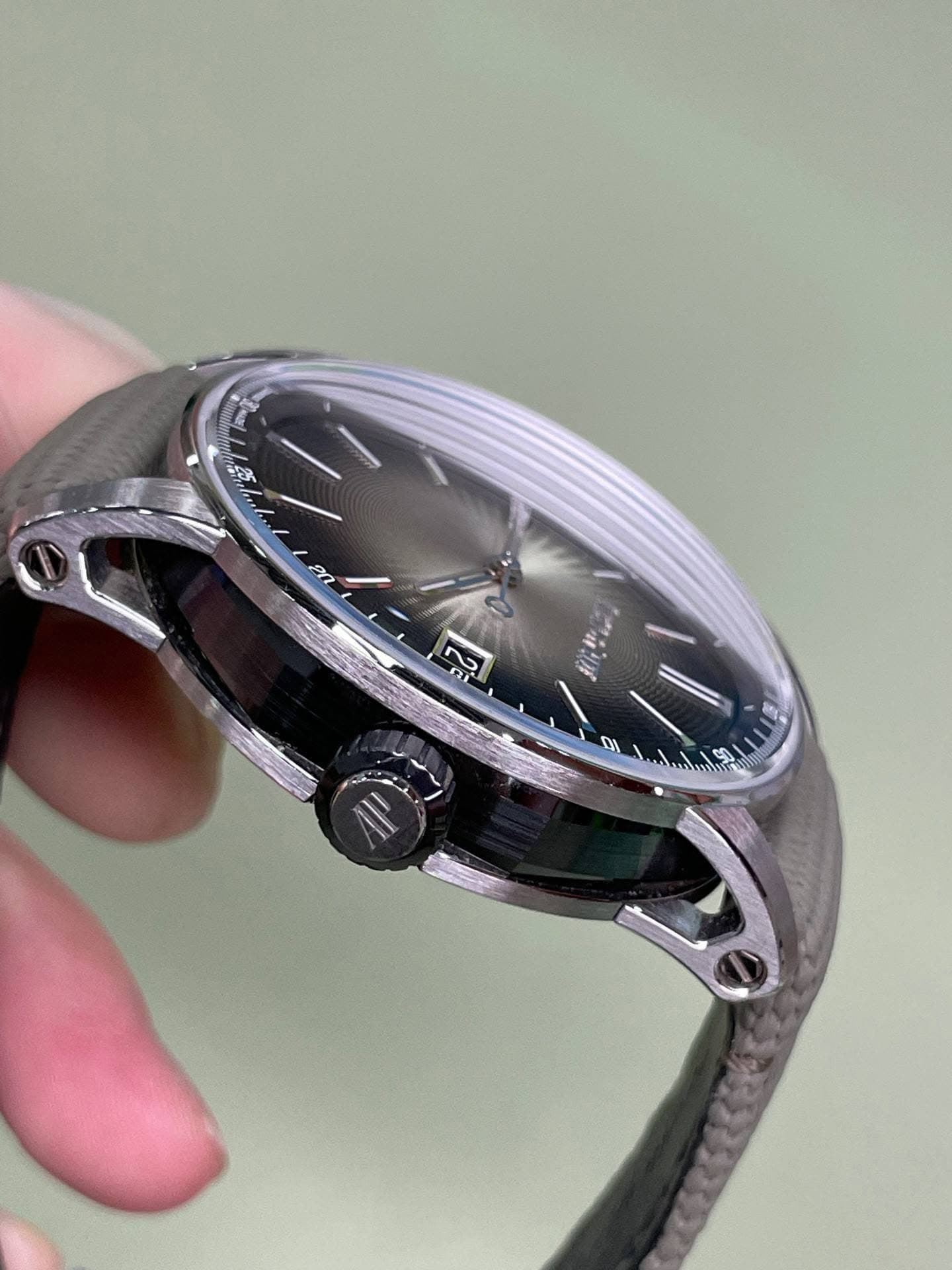 May be an image of wrist watch and text