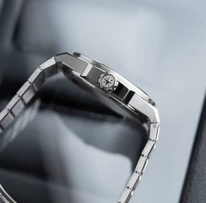 May be an image of digital watch and phone