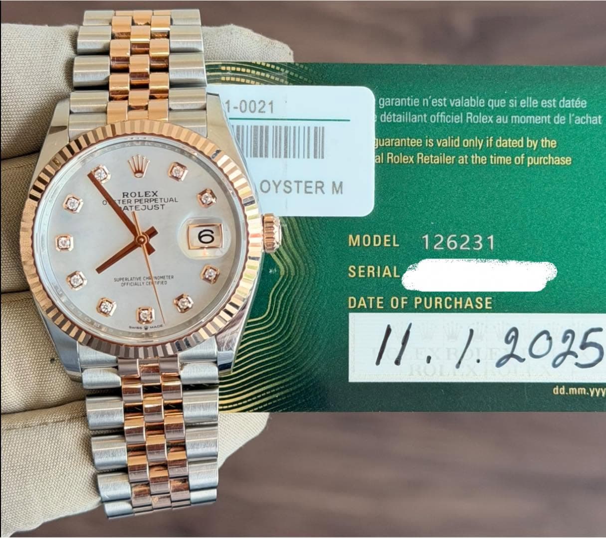 May be an image of wrist watch and text that says '1-0021 D garantie 'est valable que elle est datée détaillant officiel Rolex au moment de l'achat ROLEX O TERP ARESUSTUAL ATE…