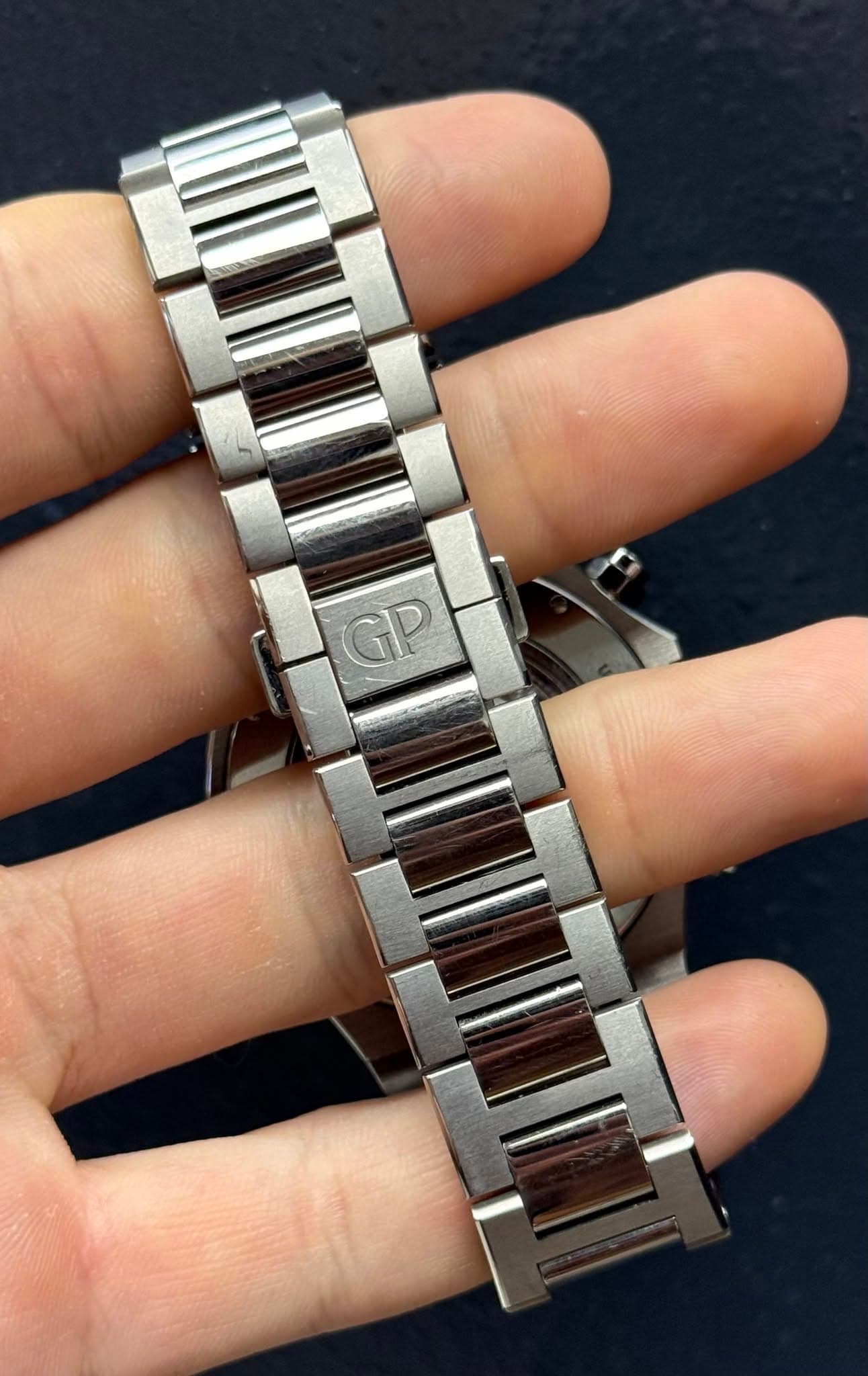 May be an image of wrist watch