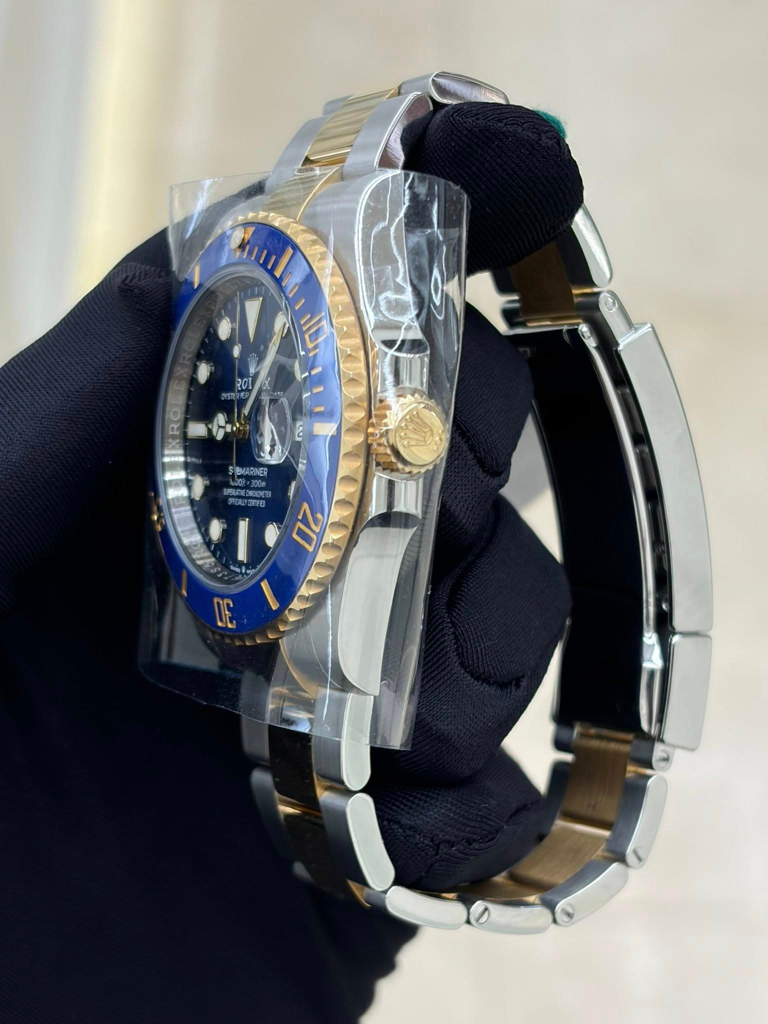 May be an image of wrist watch and text