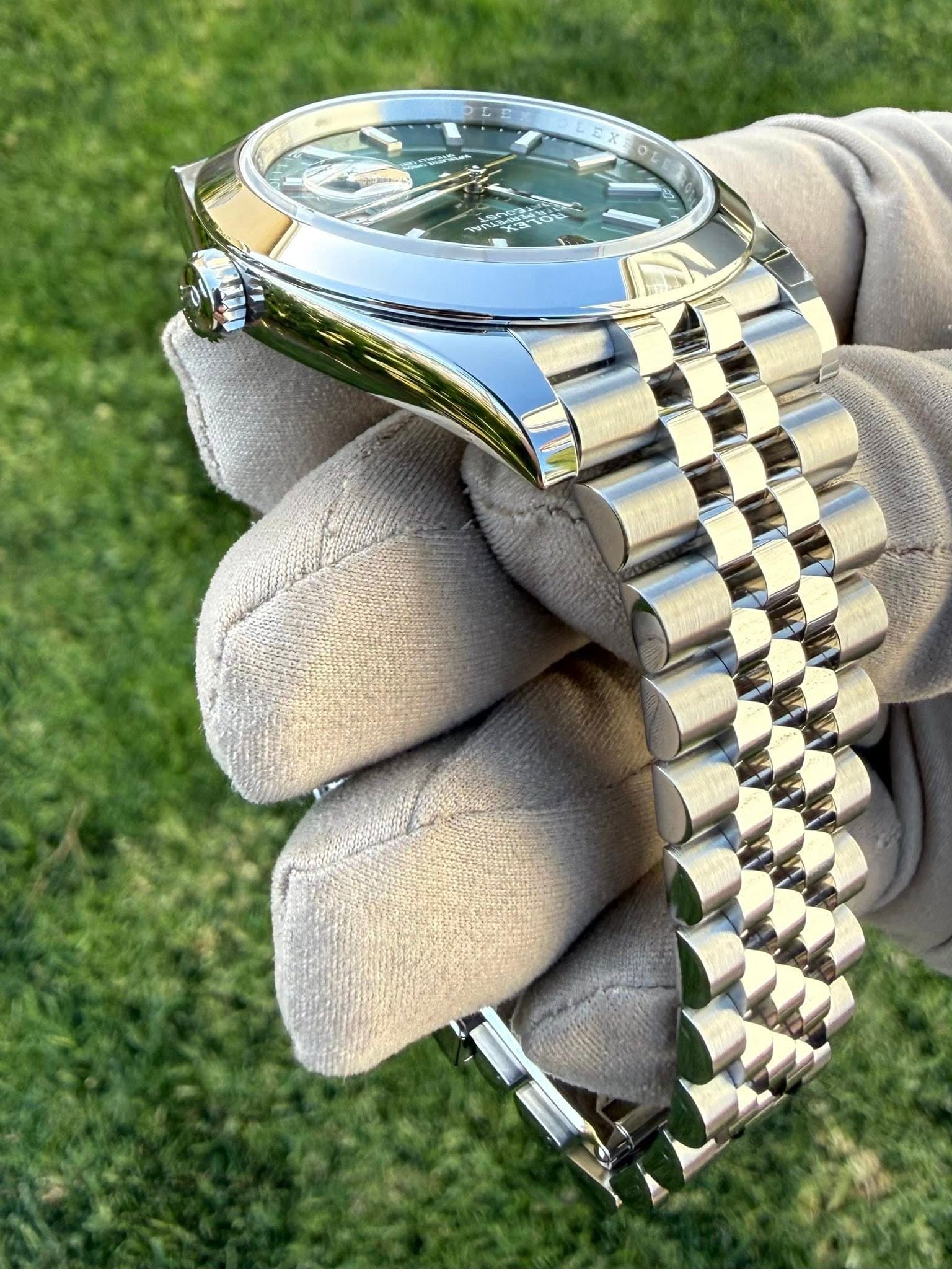 May be an image of wrist watch and text