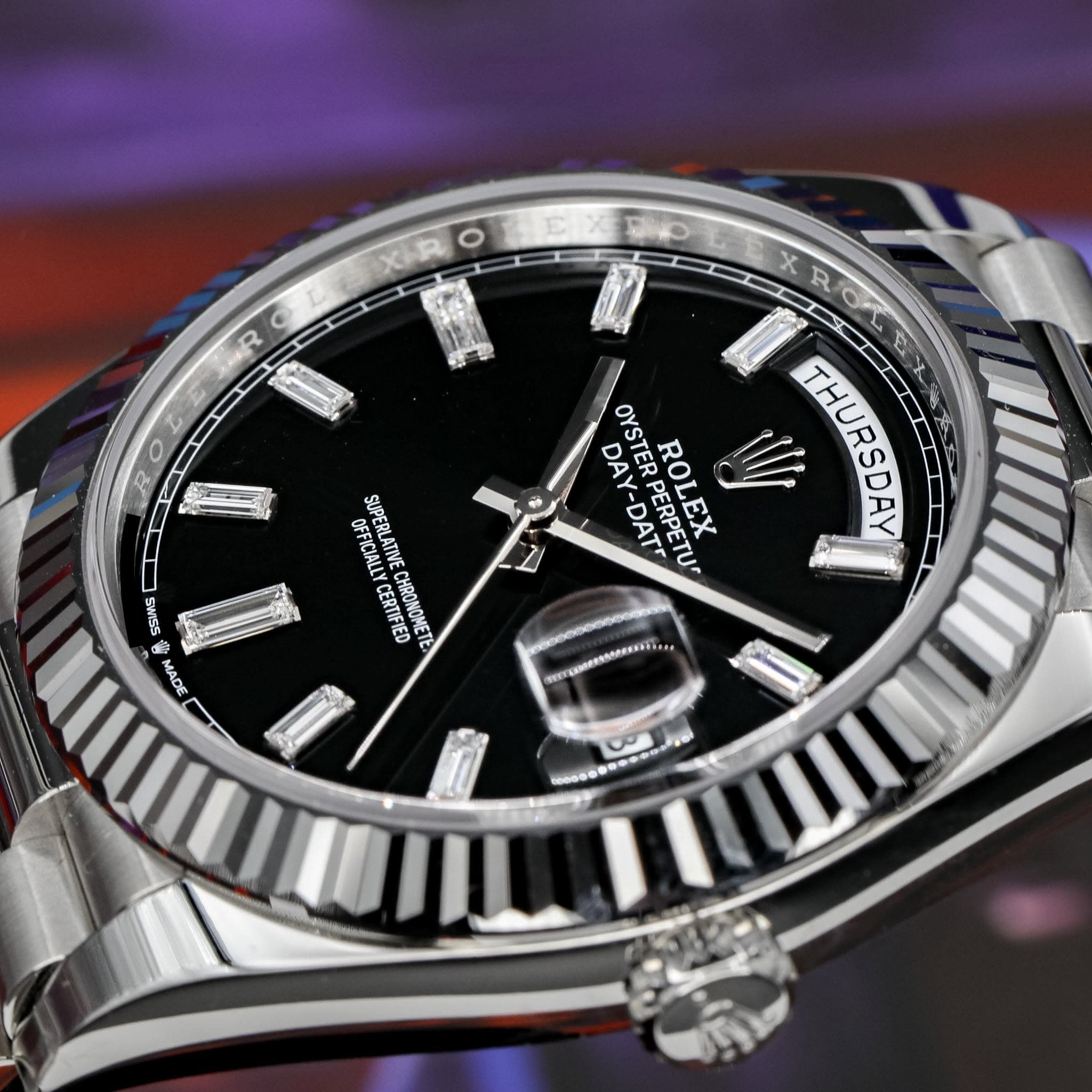 May be an image of wrist watch and text that says 'R L RO ROL E DAY OYSTER DAY-DAT STEREDOAT PERPETU ROLEX W THURSDAY AY-DAT SWISS MADE OFFICIALLYCERTIFIED ATIE OFFICIALLY…