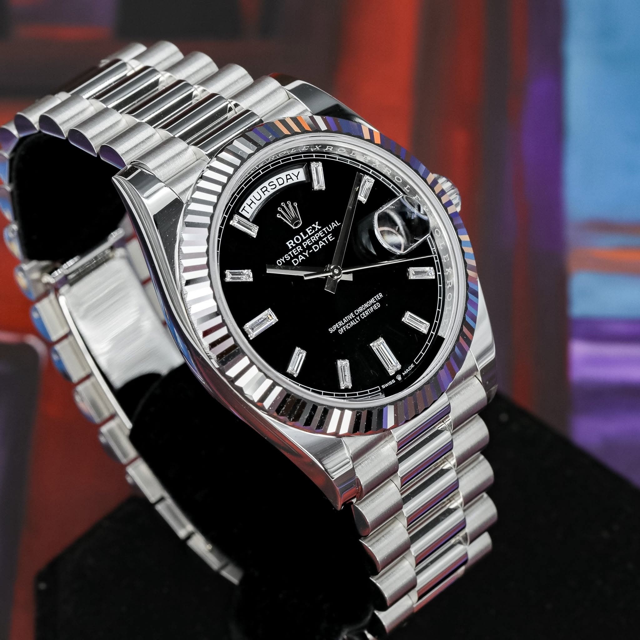 May be an image of wrist watch and text