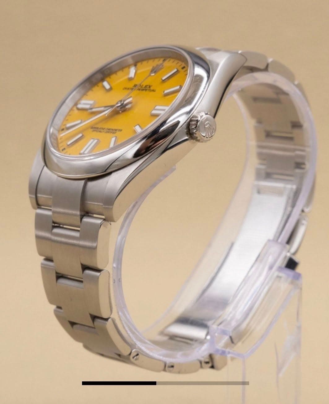 May be an image of wrist watch and text