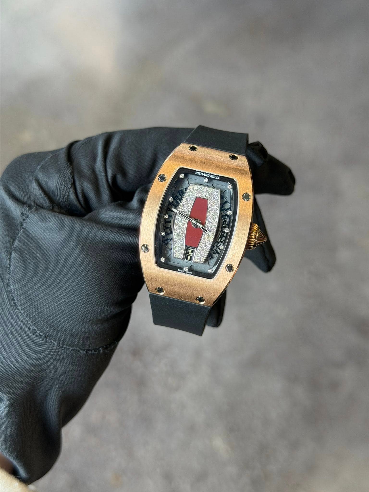 May be an image of wrist watch and text